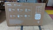 TCL 65" 4K UHD SMART TV (GOOGLE TV). 65-inch television sold for repair or parts, potentially Image - 1