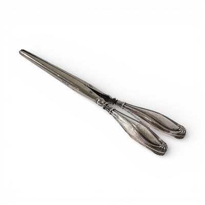 GLOVE STRETCHER. English shell glove stretcher, both with hollow handles molded with reliefs and 