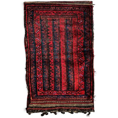 BALUCHI TRIBAL WOOL RUG - MID-20TH CENTURY. Baluchi rug, hand-woven by nomadic tribes in the 