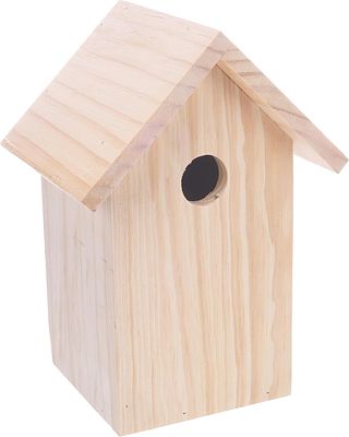 FLAMINGO NEST BOX IN NATURAL WOOD TRUNK. Natural wood nest box, suitable for providing shelter 