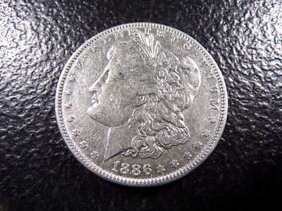 1886 MORGAN SILVER DOLLAR. CLICK THE LINK FROM YOUR INVOICE TO PAY... INVOICES ARE EMAILED 