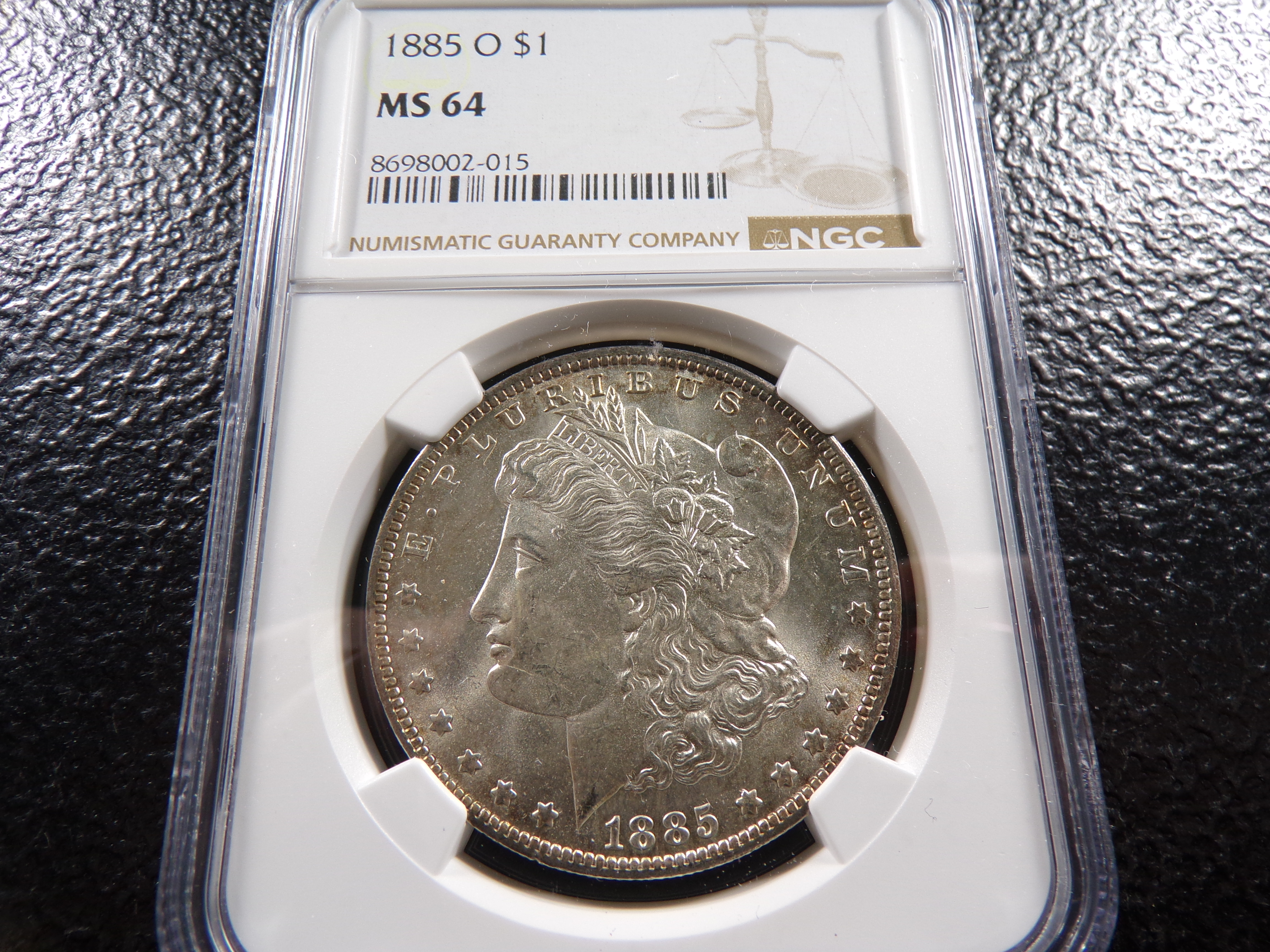1885-O NGC MS64 HIGH GRADE MORGAN SILVER DOLLAR