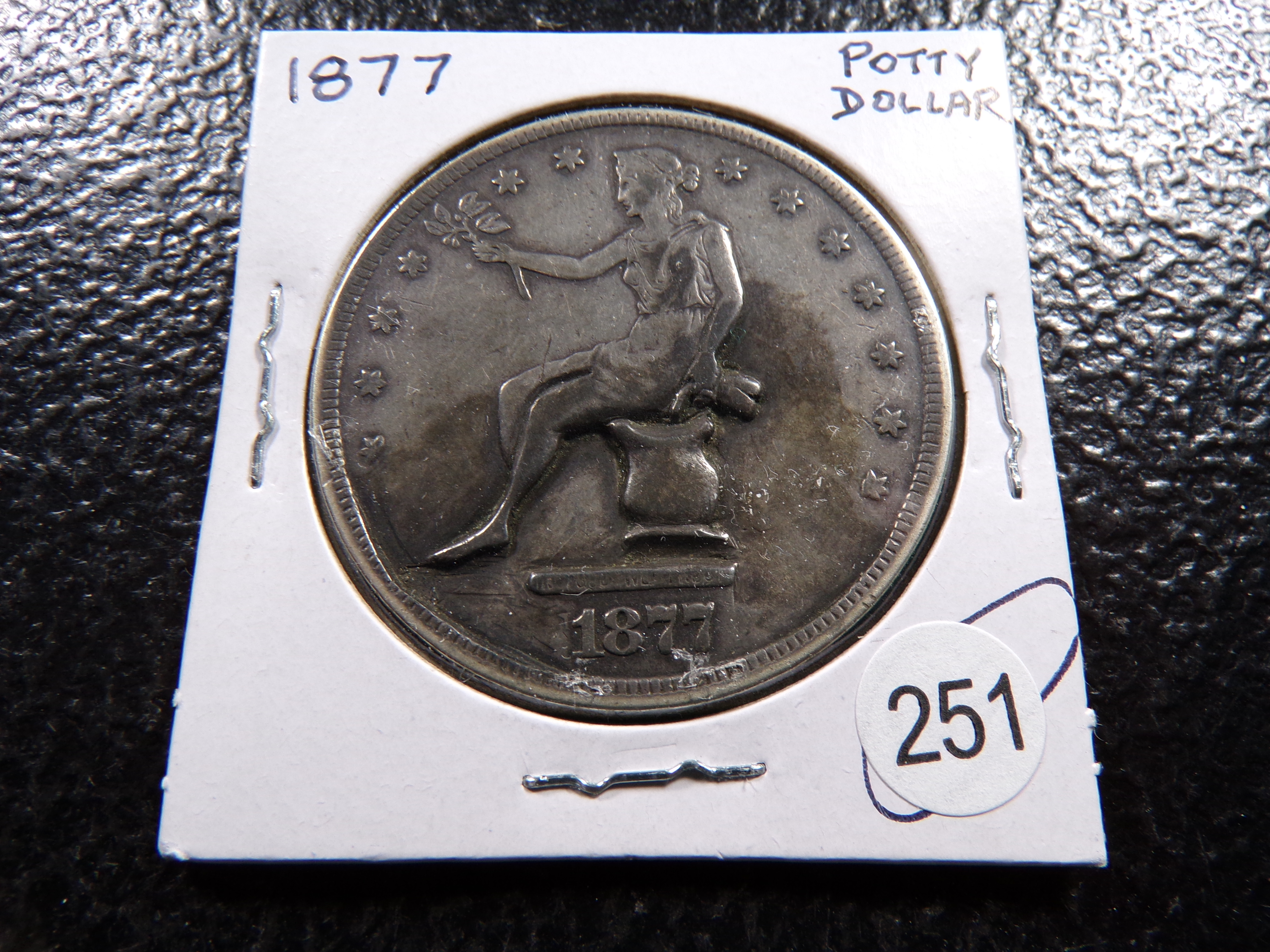 1877 SEATED LIBERTY SILVER TRADE DOLLAR