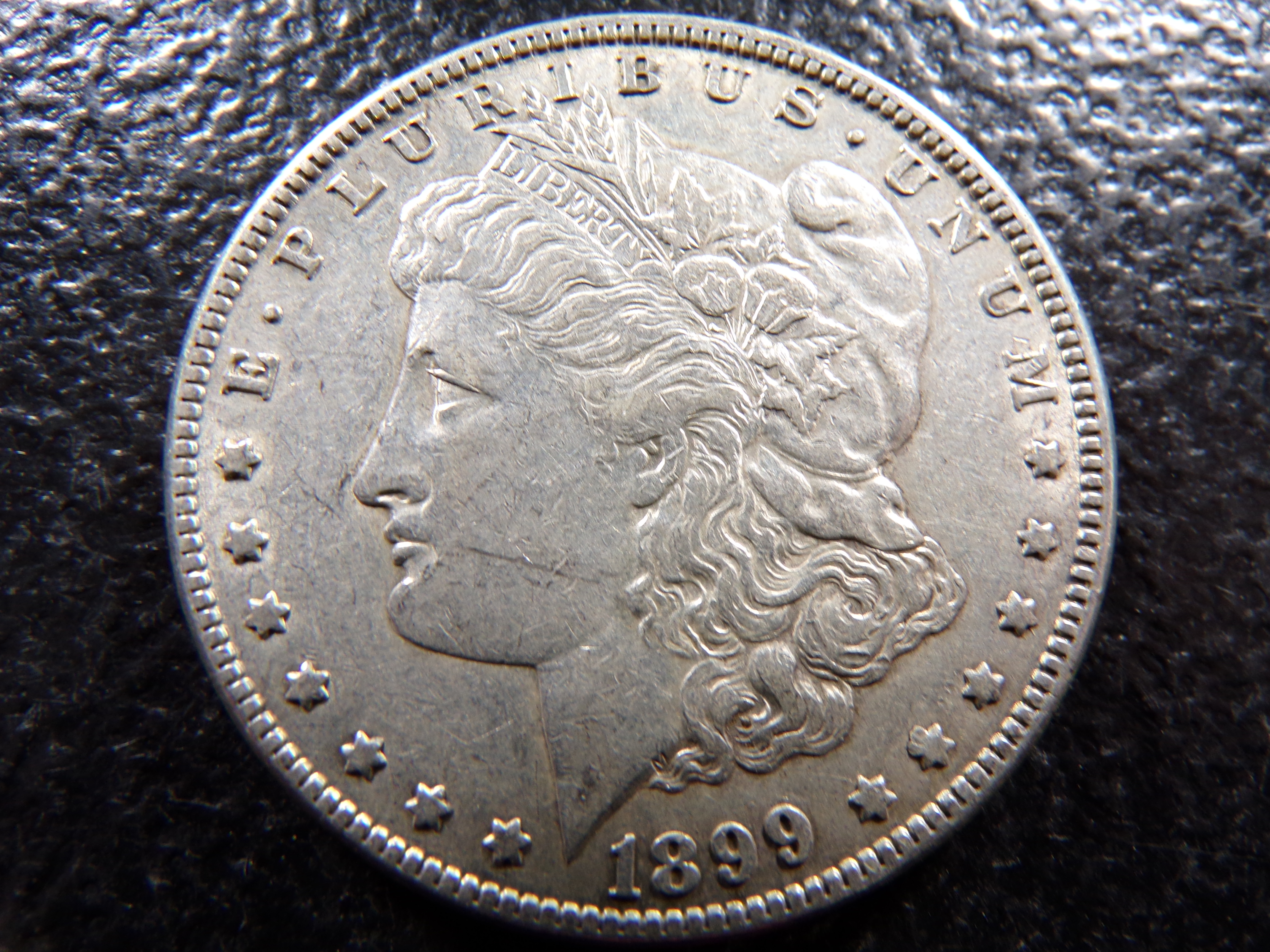 1899-O MORGAN SILVER DOLLAR