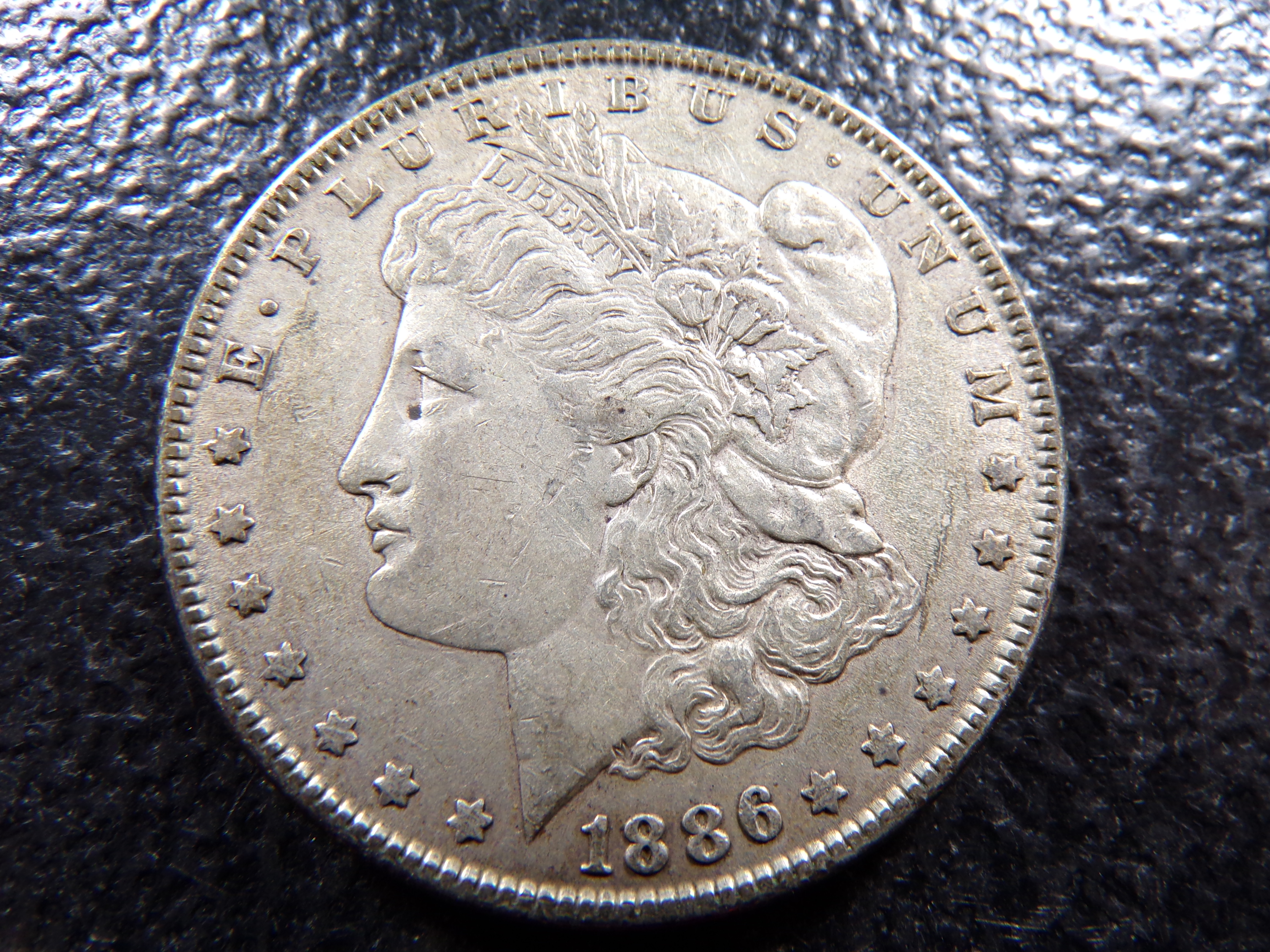 1886 MORGAN SILVER DOLLAR