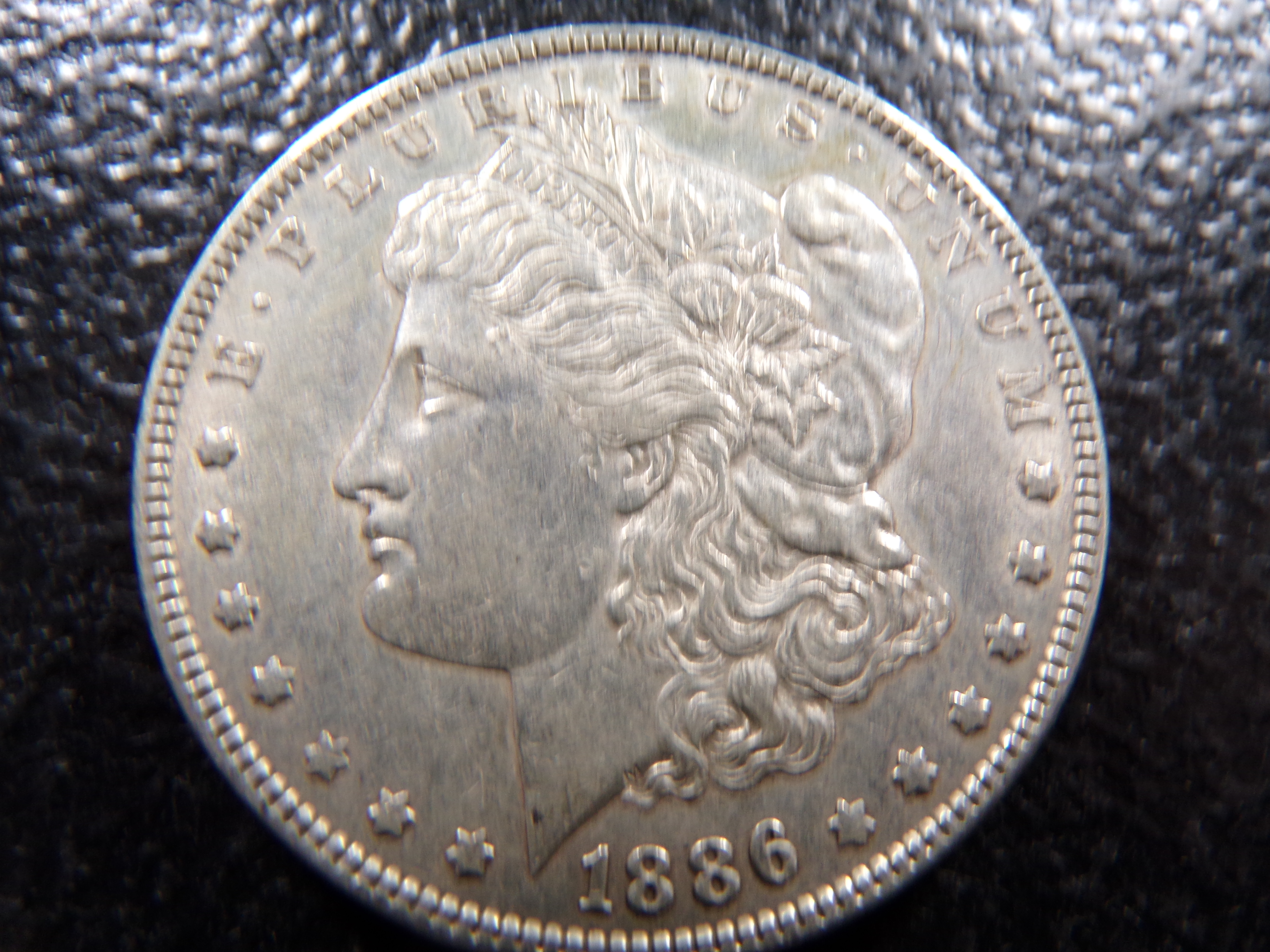 1886 MORGAN SILVER DOLLAR