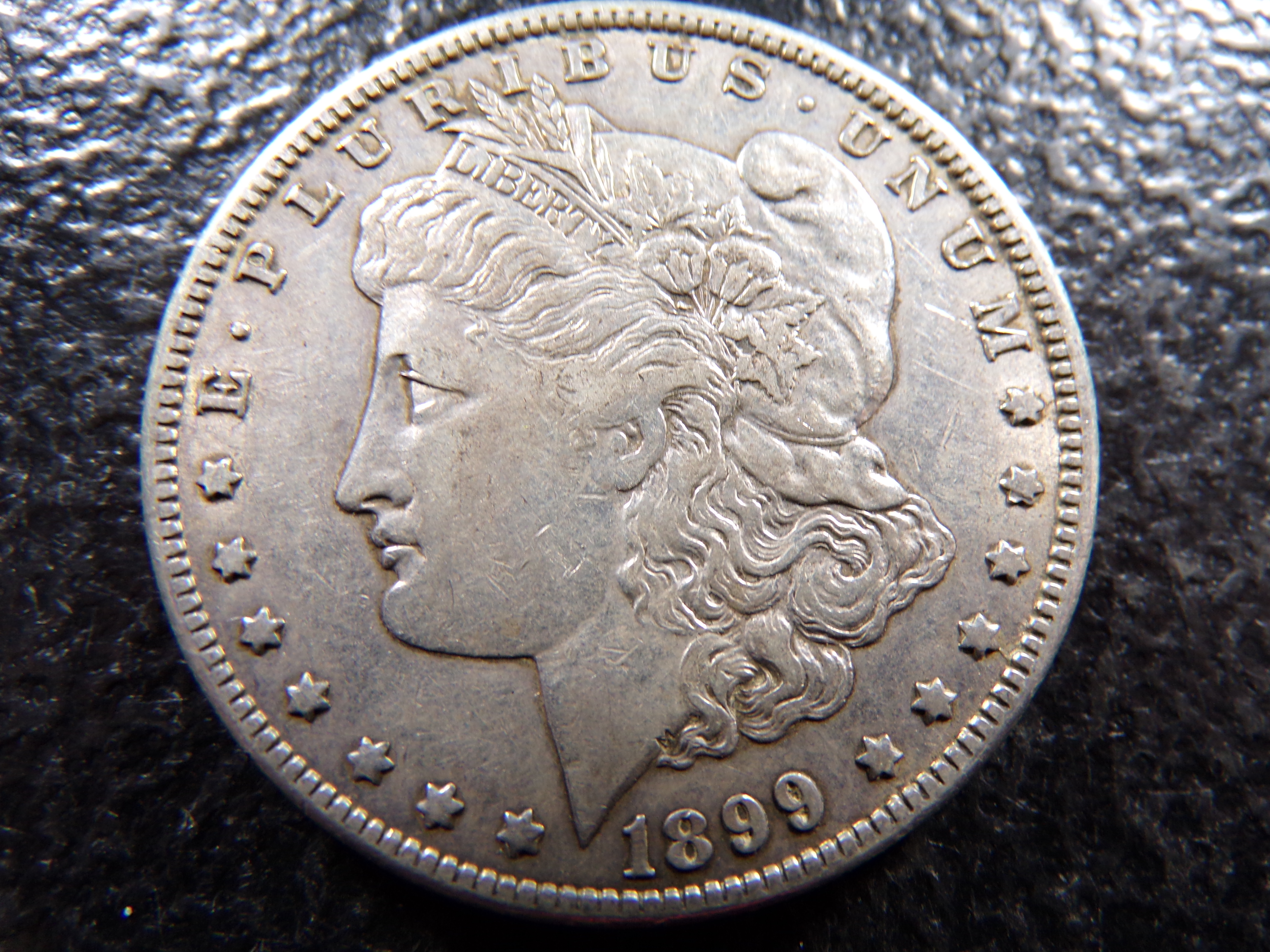 1899-O MORGAN SILVER DOLLAR