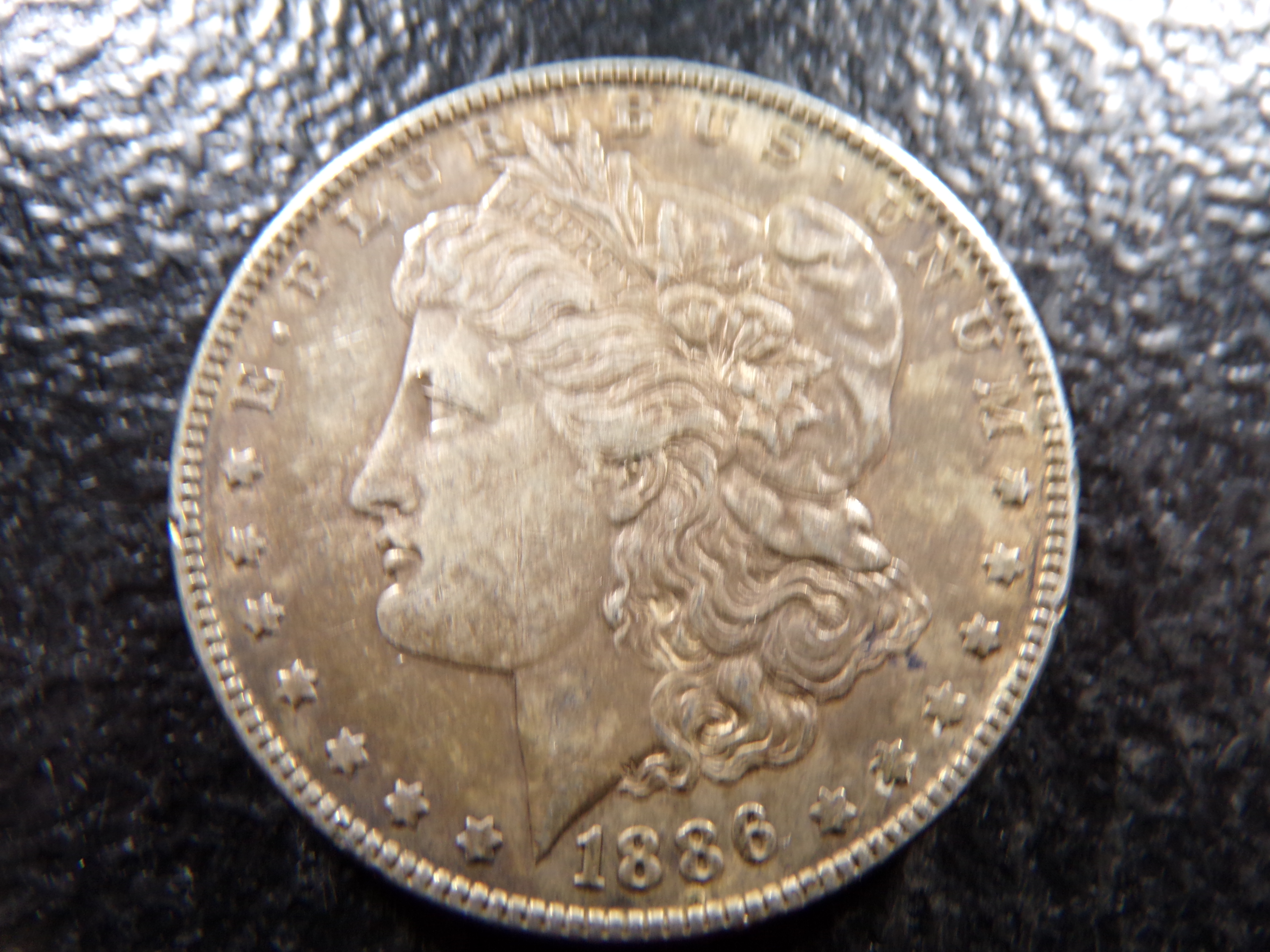 1886 MORGAN SILVER DOLLAR