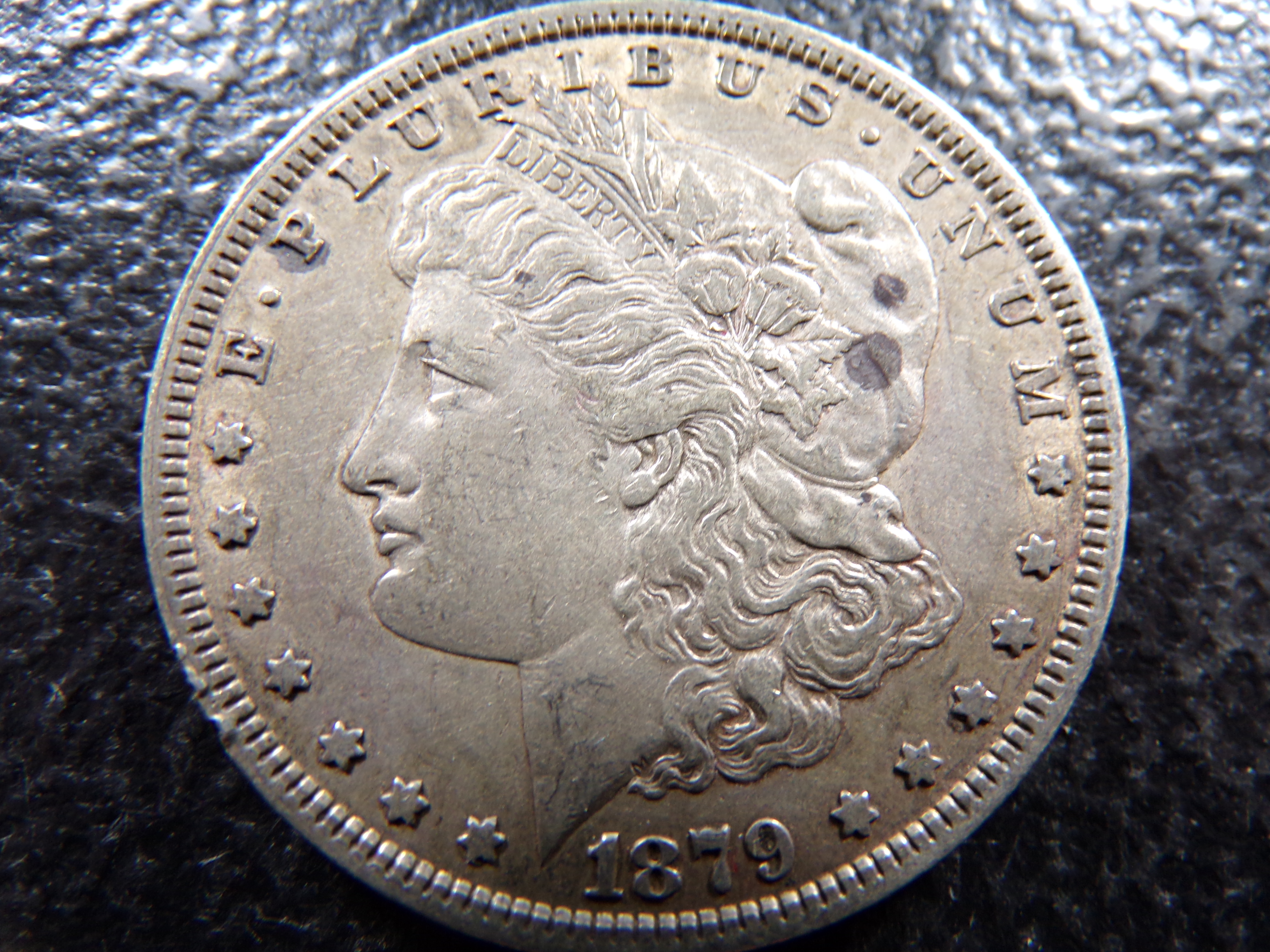 1879 MORGAN SILVER DOLLAR