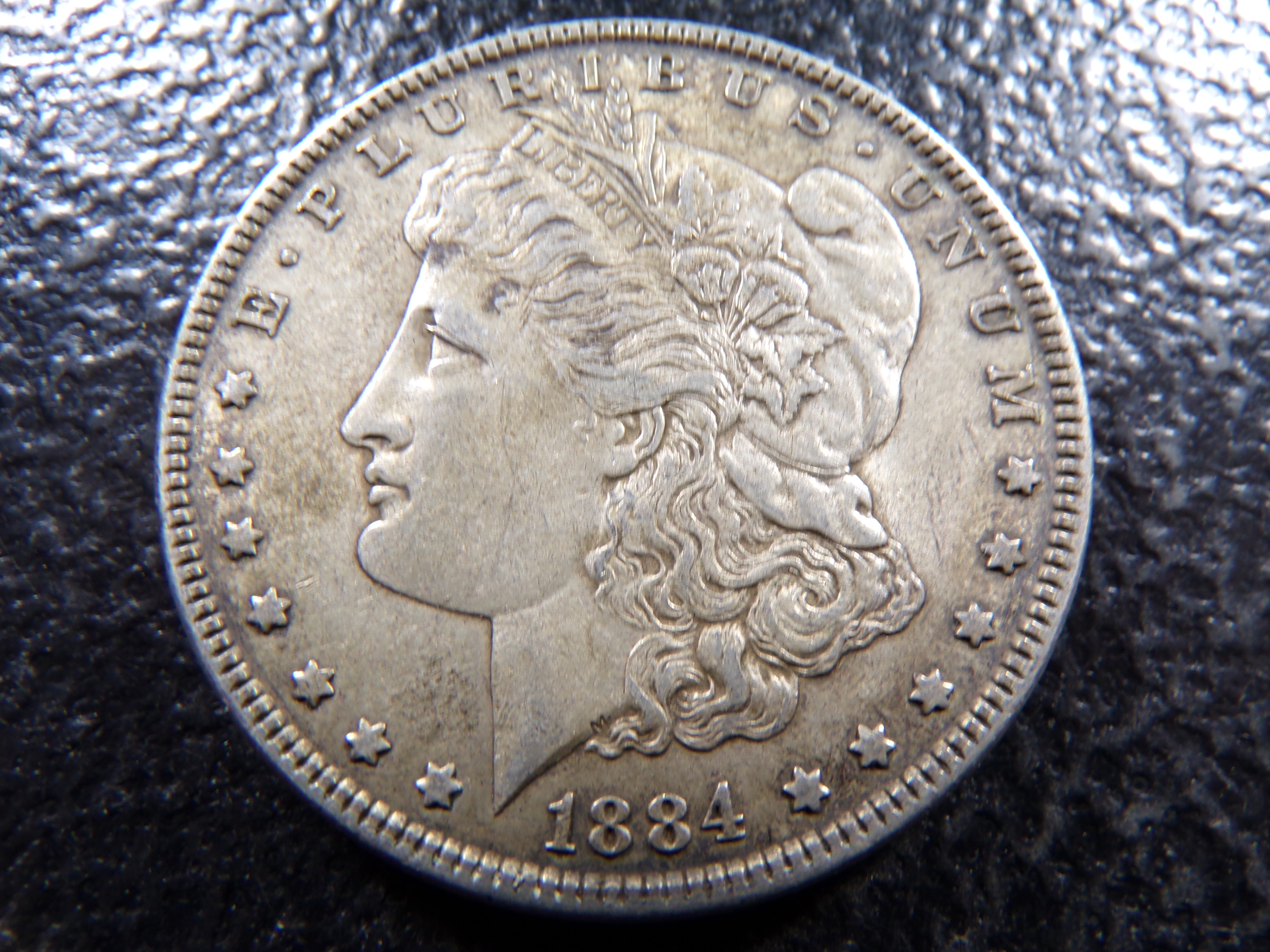 1884 MORGAN SILVER DOLLAR