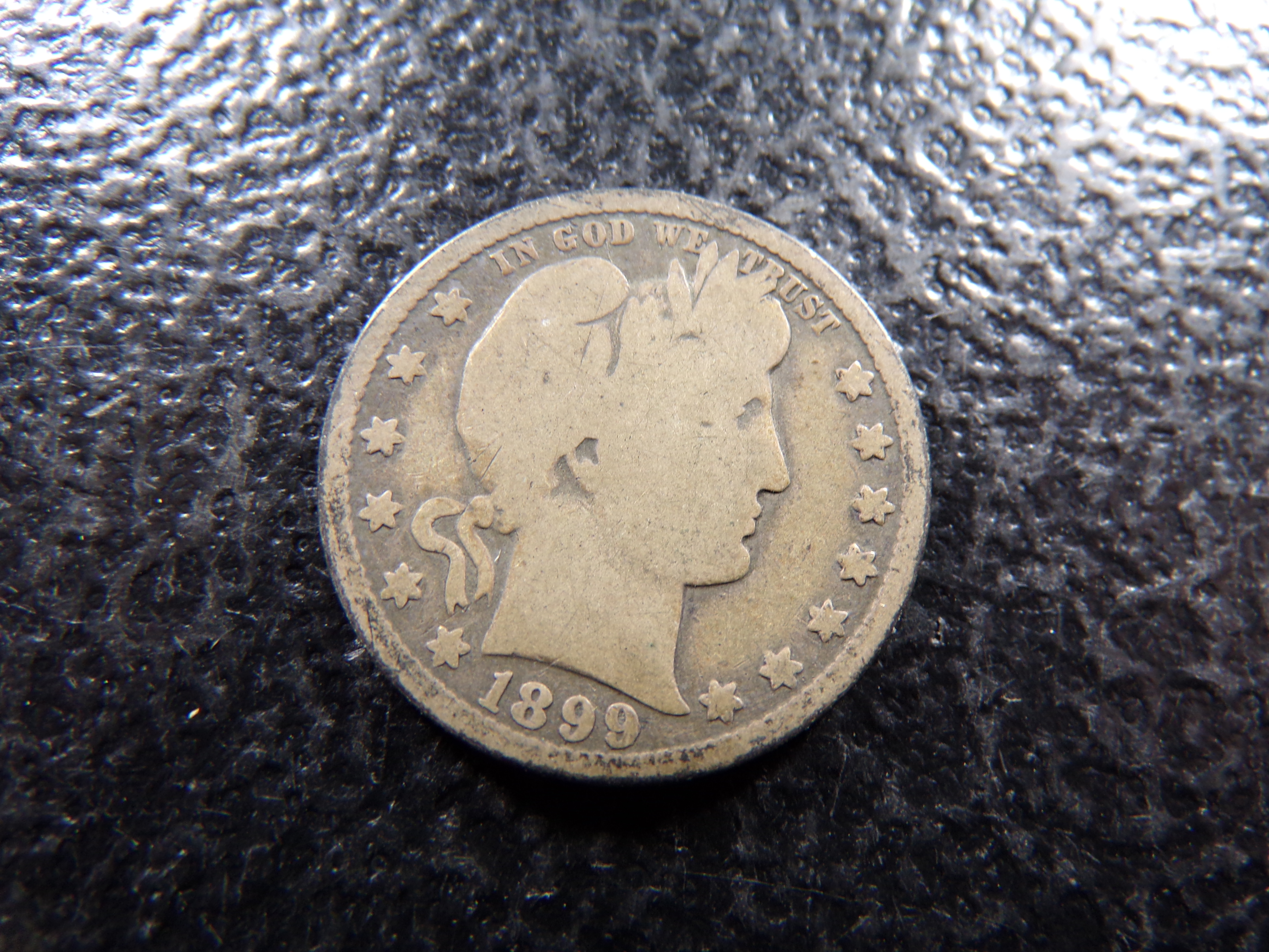 1899-O BARBER SILVER QUARTER