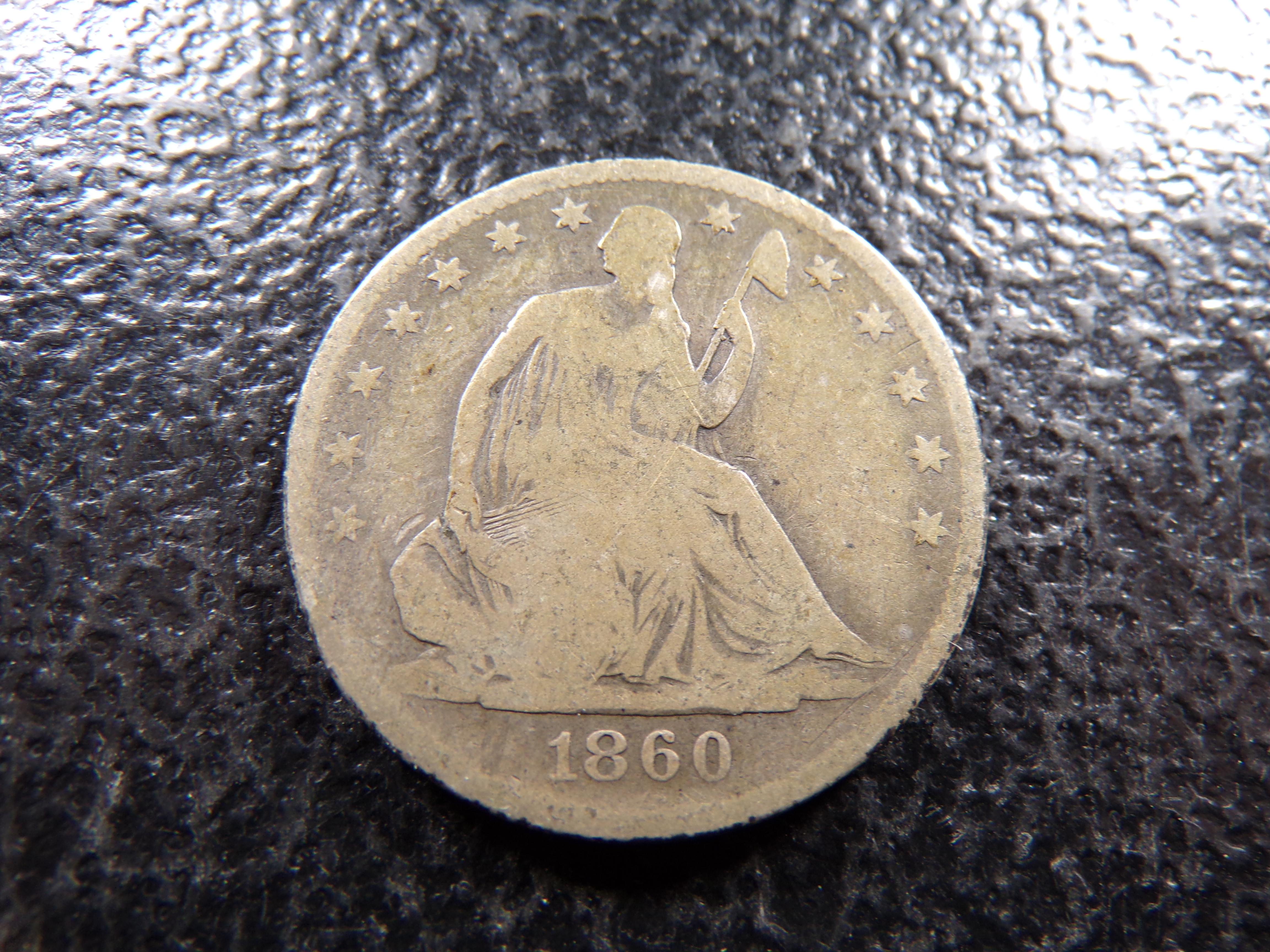 1860-O SEATED LIBERTY SILVER HALF DOLLAR