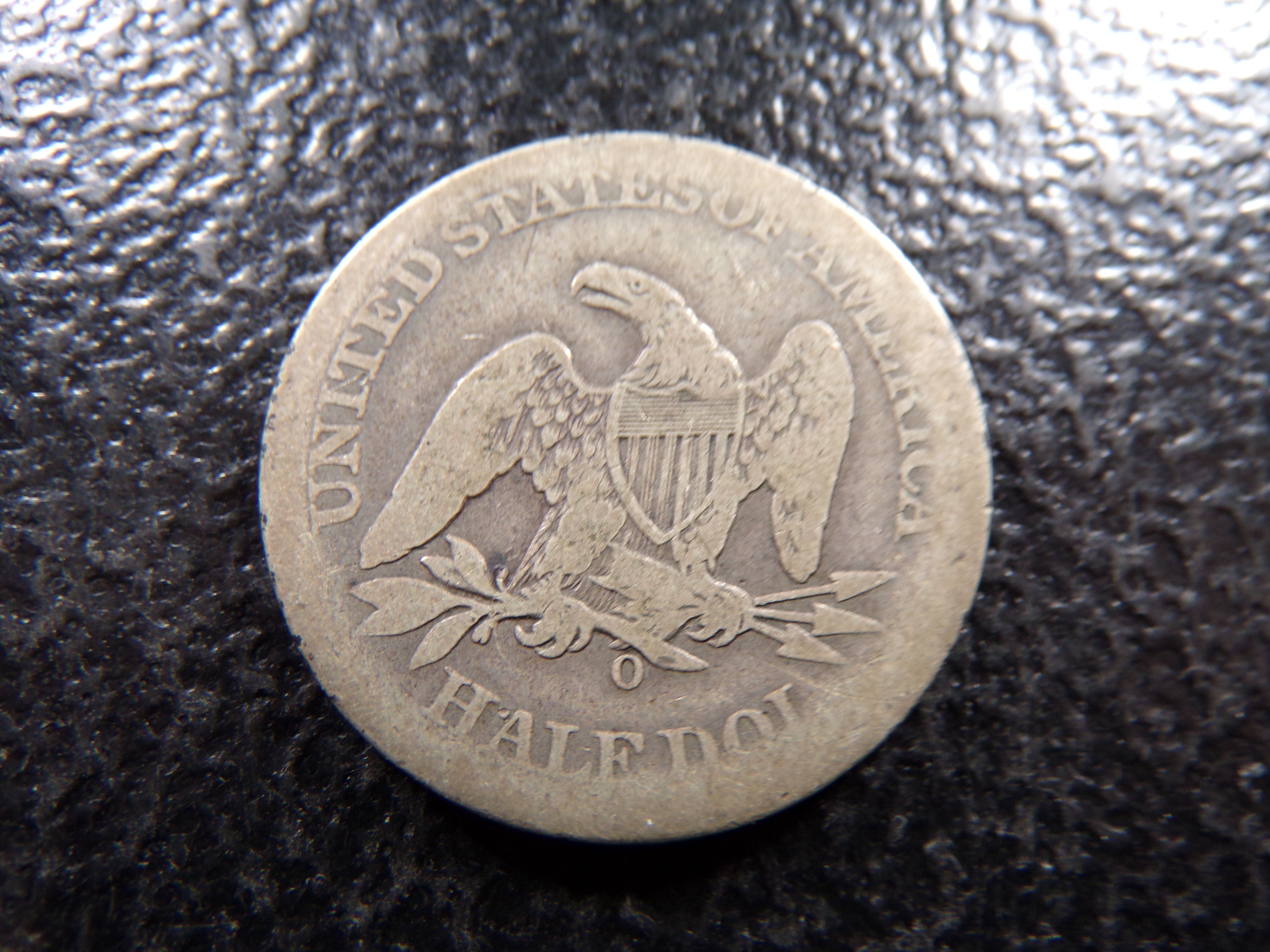 1860-O SEATED LIBERTY SILVER HALF DOLLAR