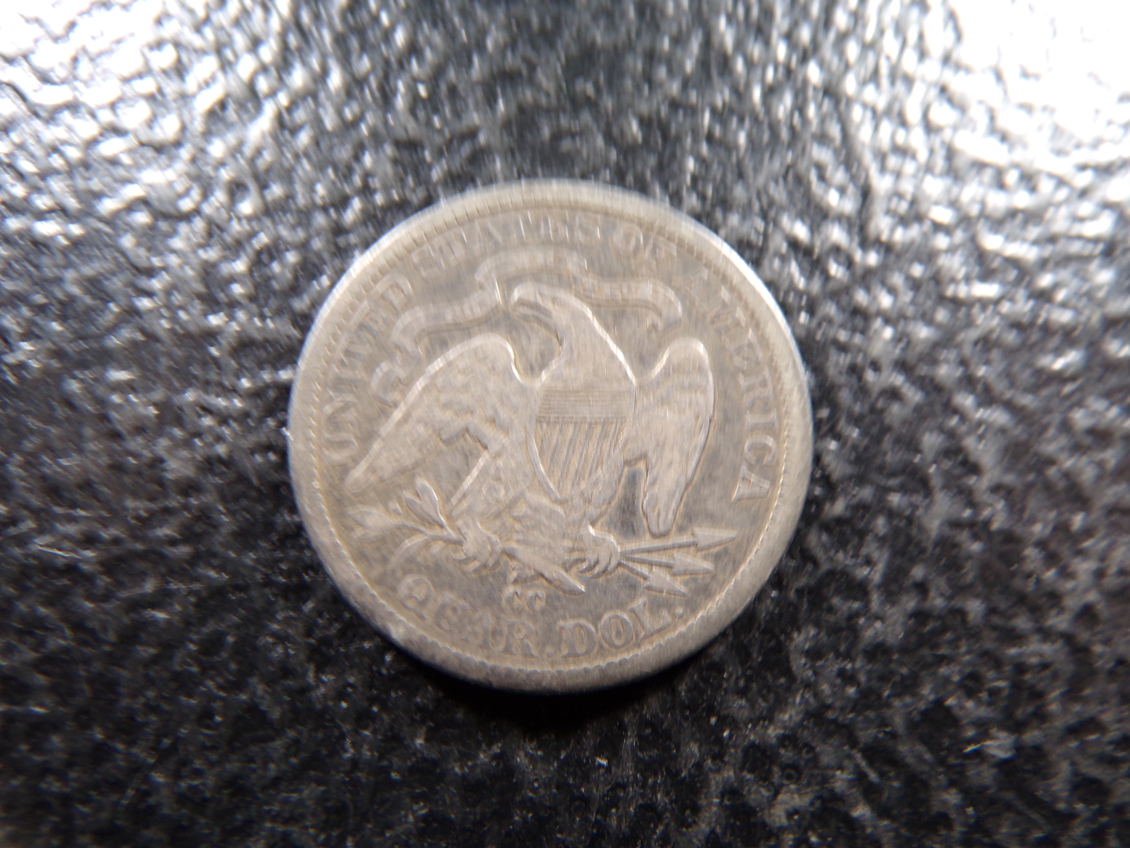 1877-CC CARSON CITY SEATED LIBERTY SILVER QUARTER
