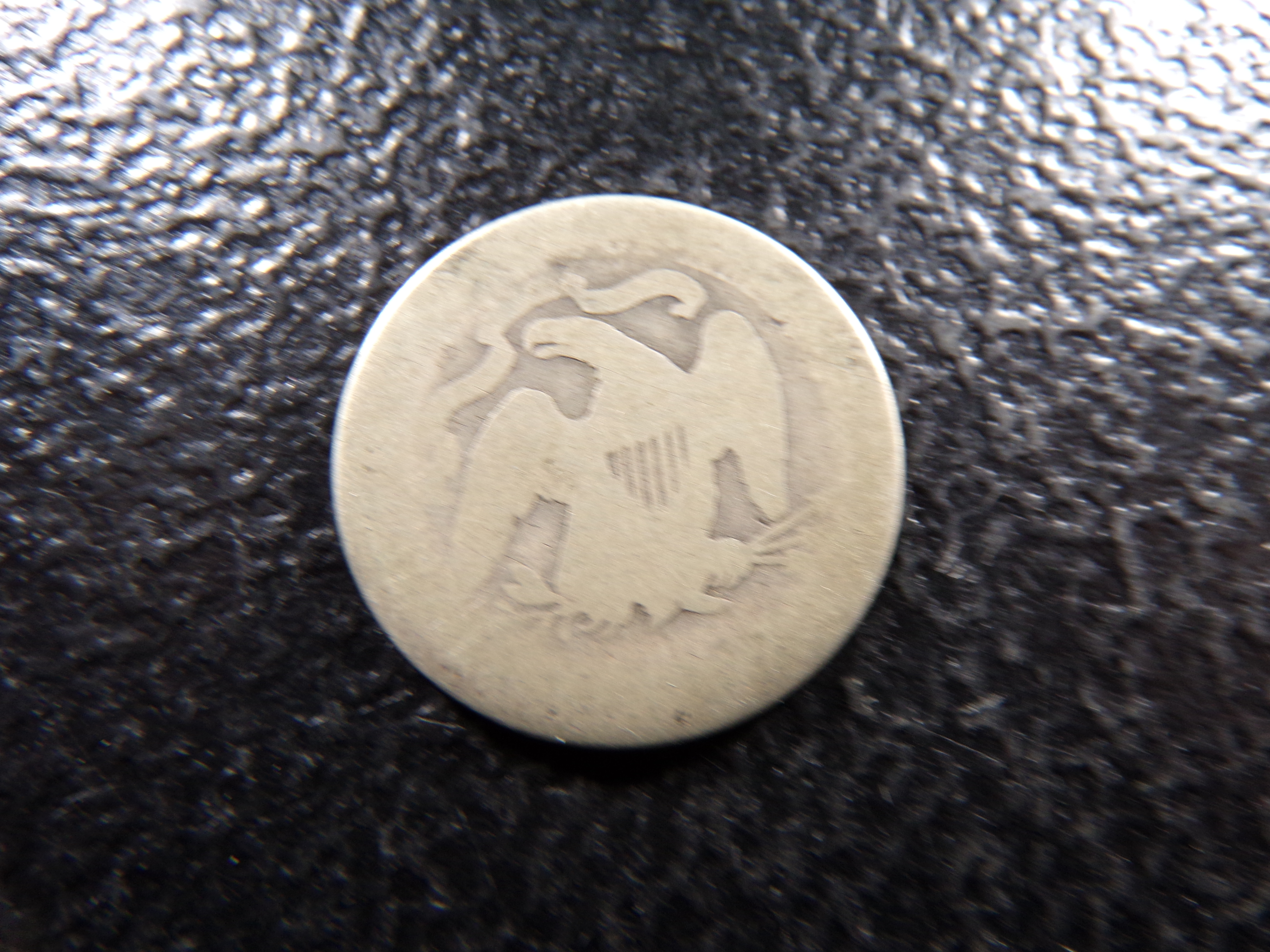 1877 SEATED LIBERTY SILVER QUARTER