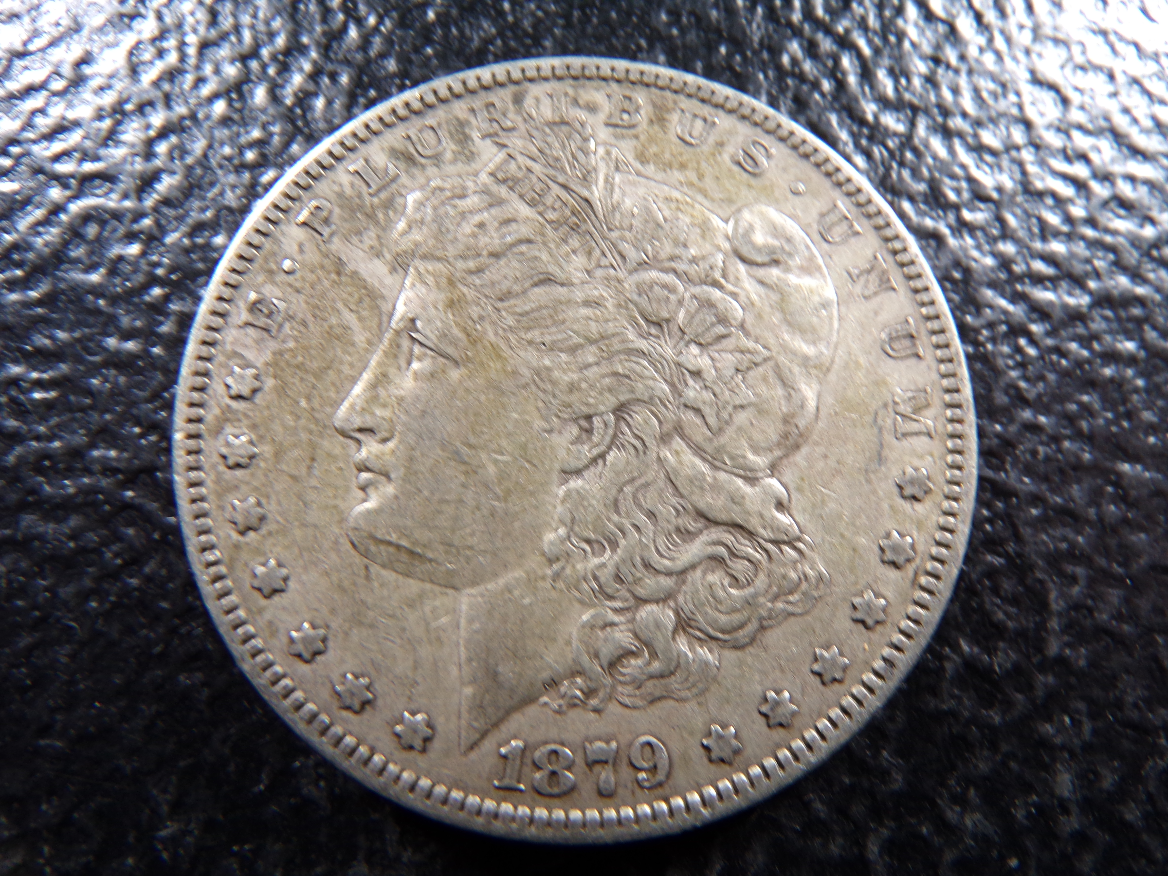 1879 MORGAN SILVER DOLLAR