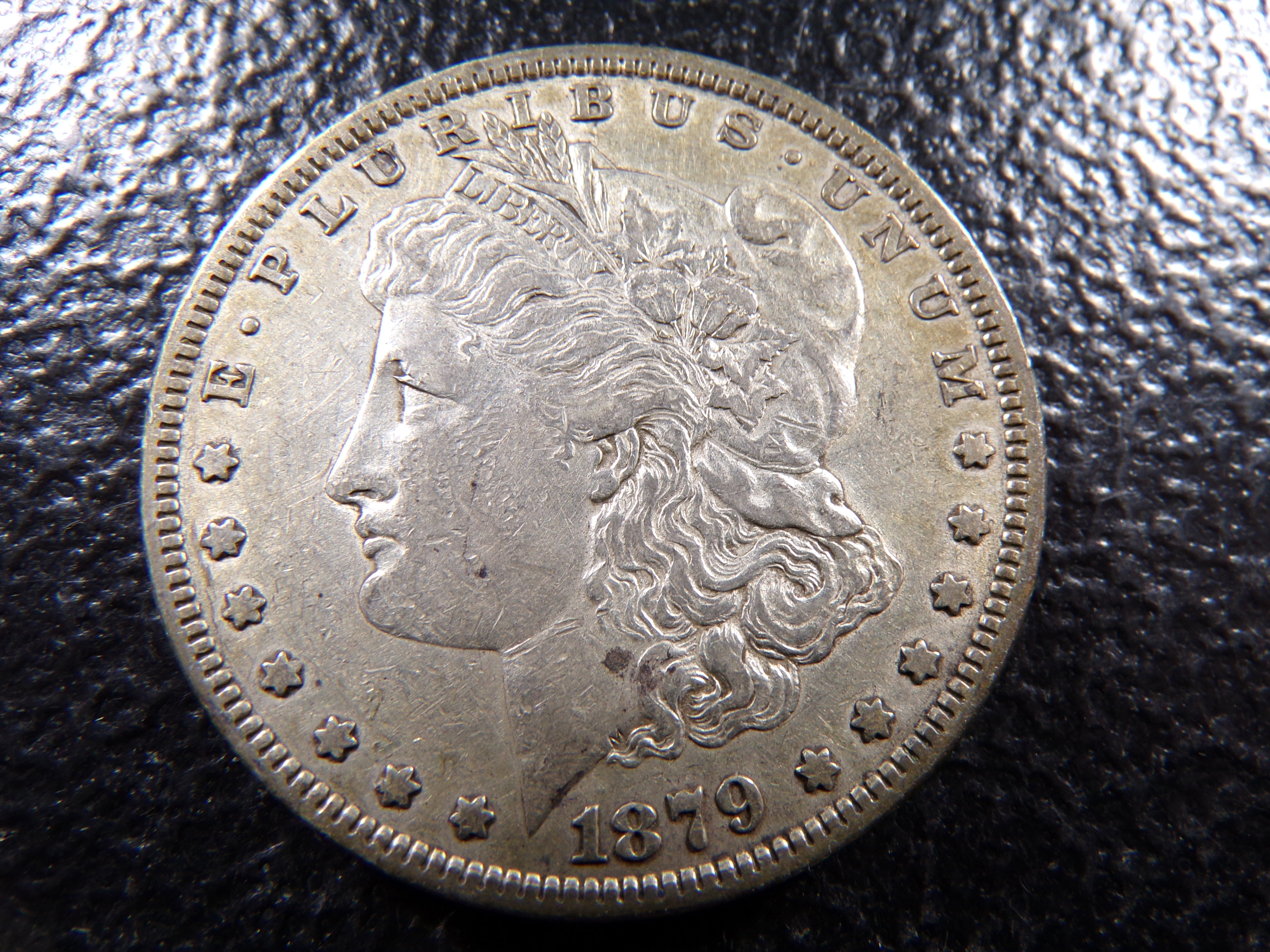 1879 MORGAN SILVER DOLLAR