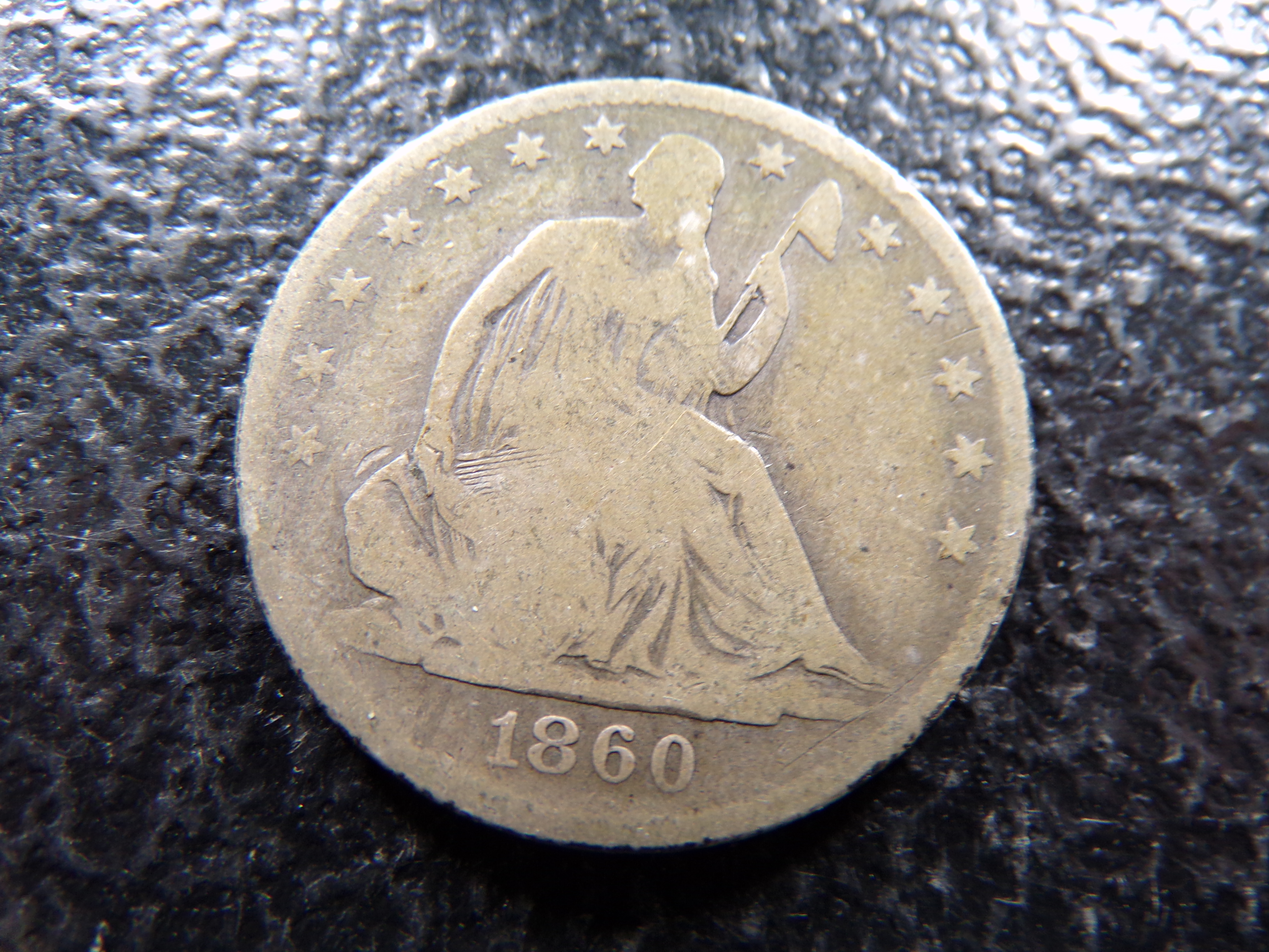 1860-O SEATED LIBERTY SILVER HALF DOLLAR