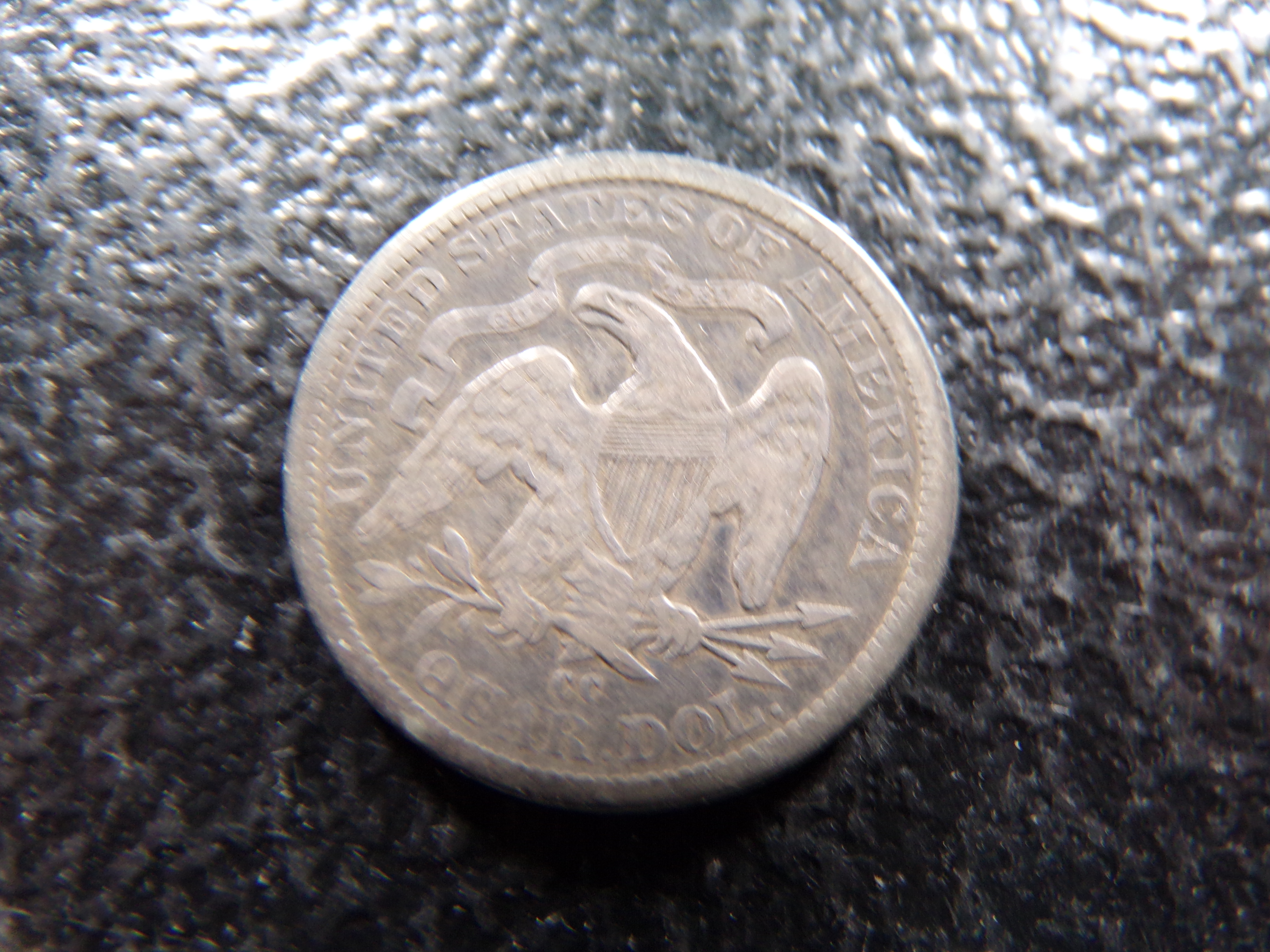 1877-CC CARSON CITY SEATED LIBERTY SILVER QUARTER