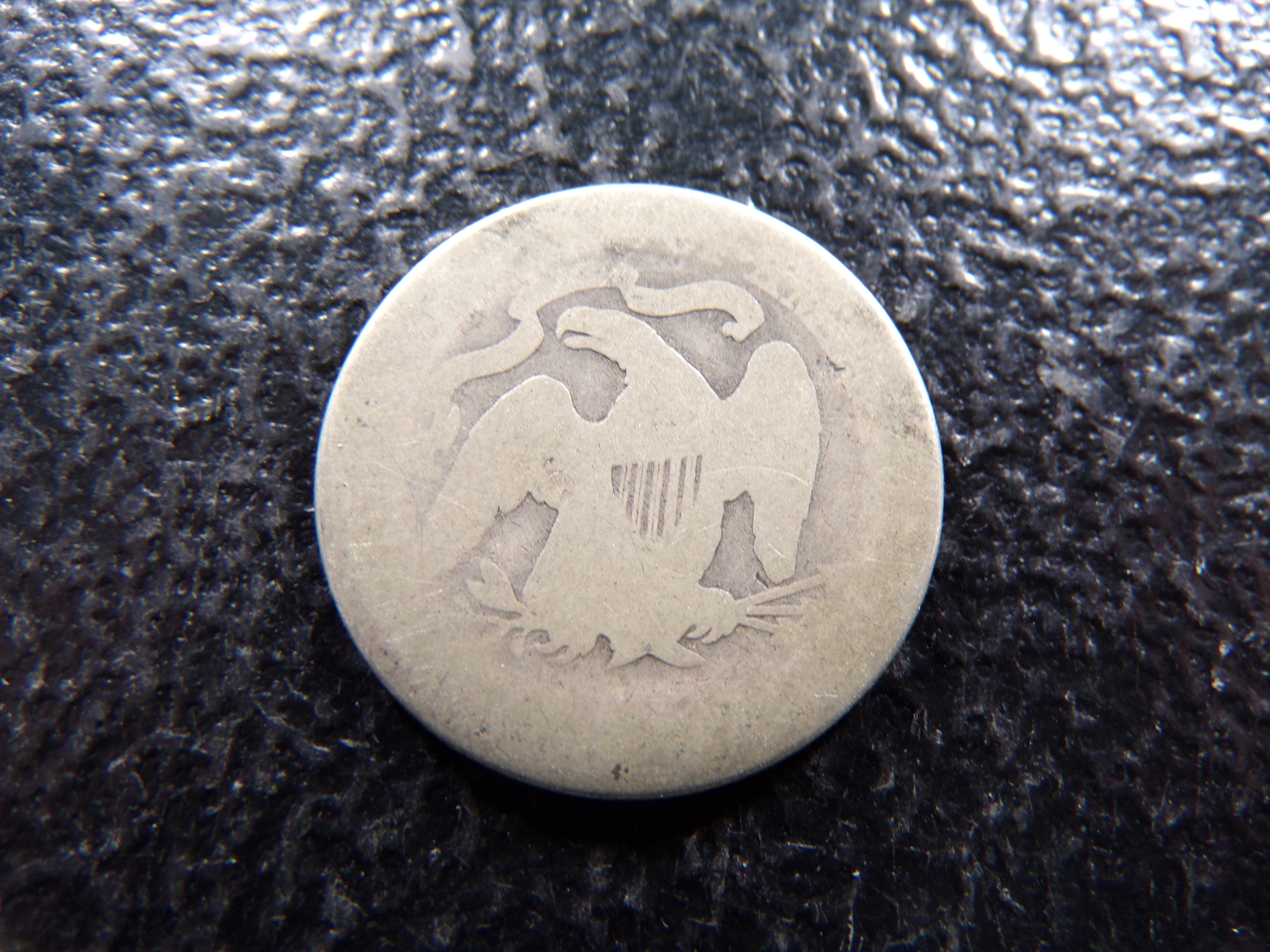 1877 SEATED LIBERTY SILVER QUARTER