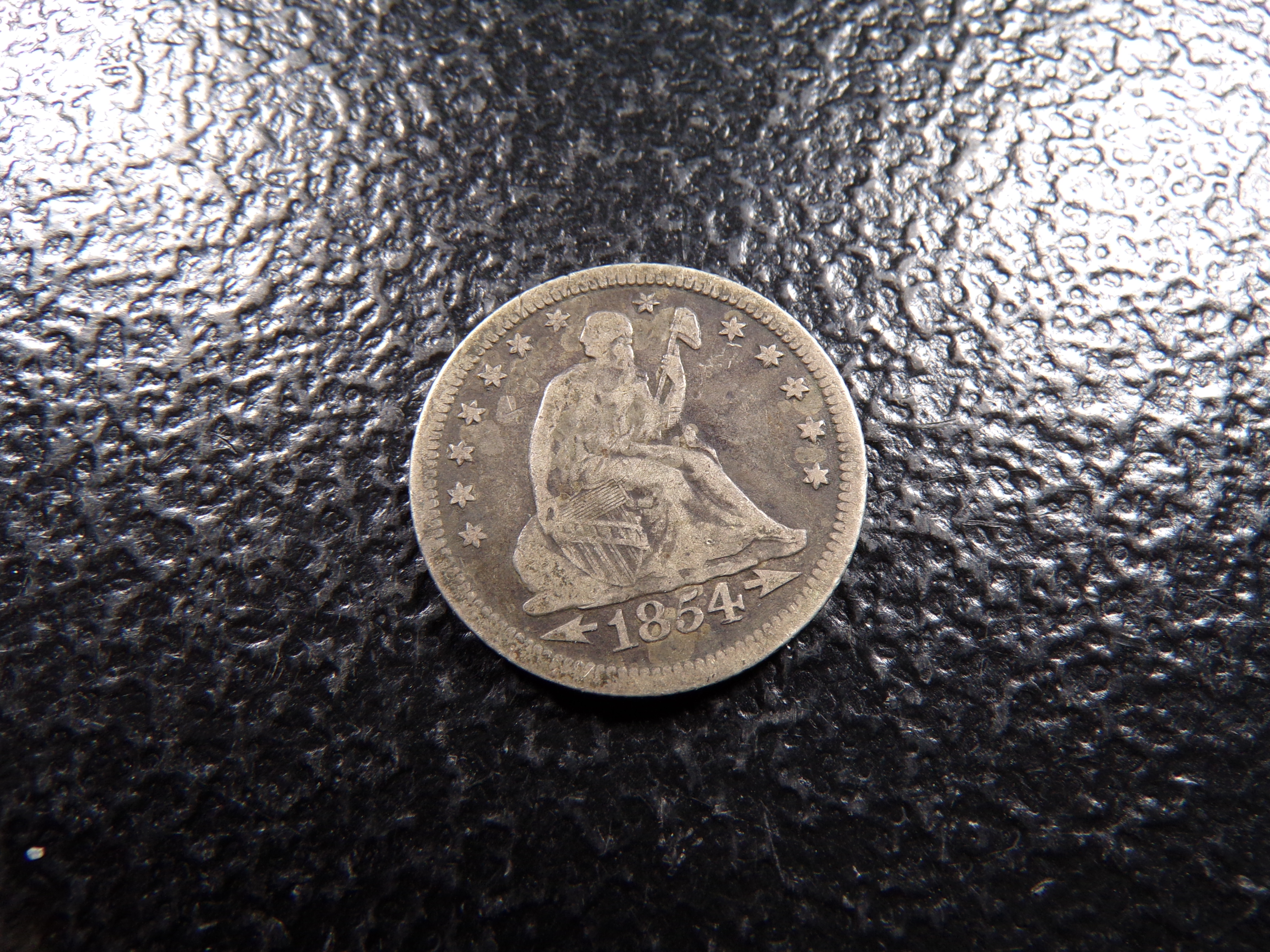 1854-O SEATED LIBERTY SILVER QUARTER