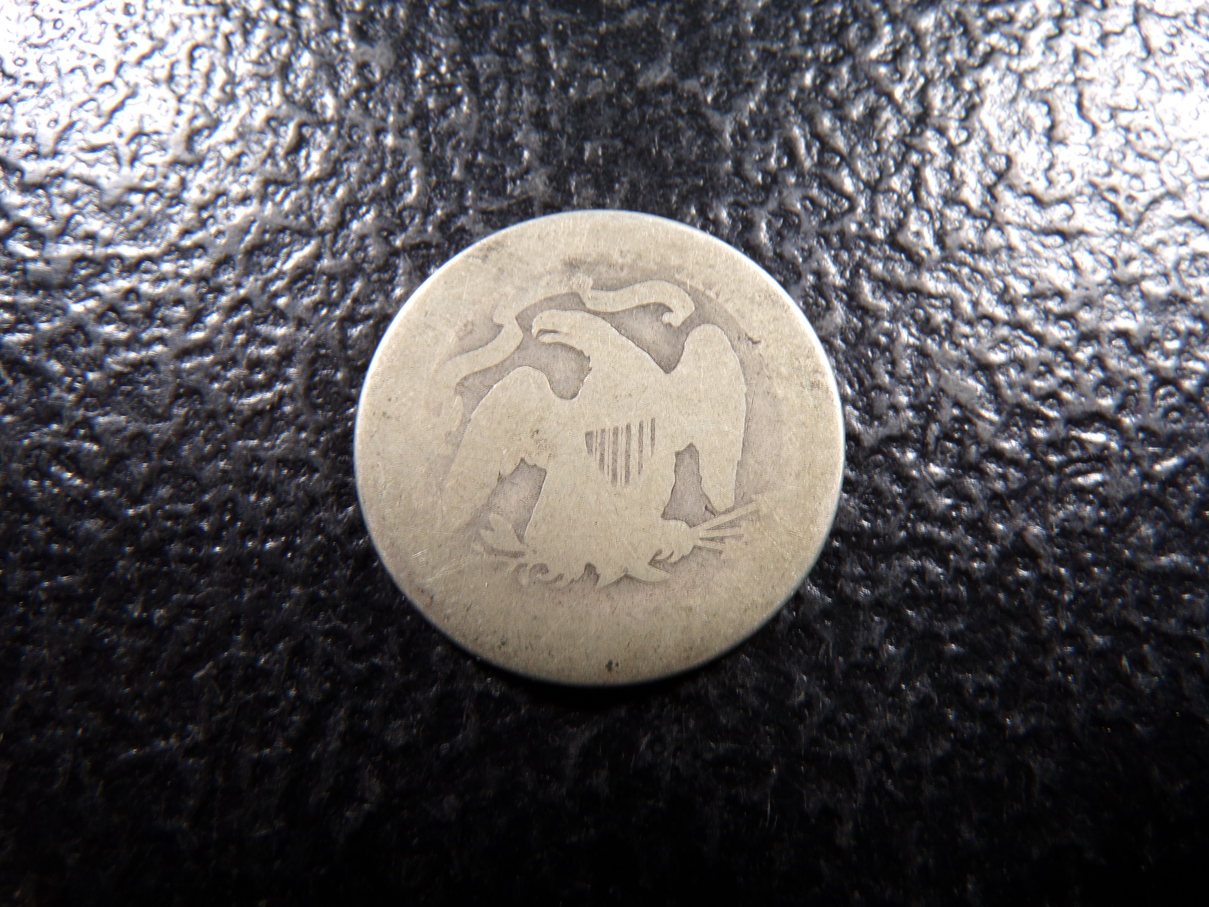 1877 SEATED LIBERTY SILVER QUARTER