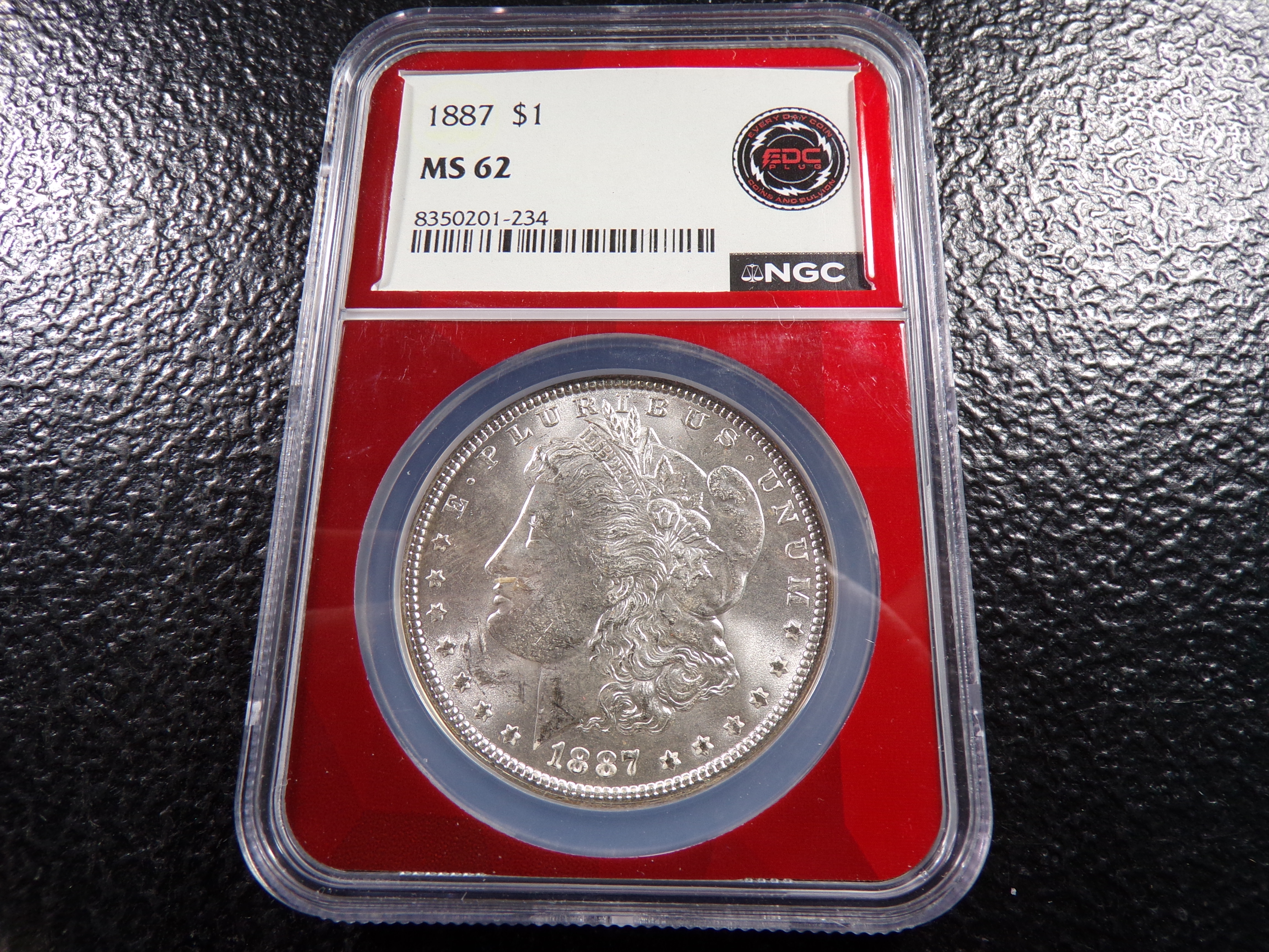 1887 NGC MS62 MORGAN SILVER DOLLAR