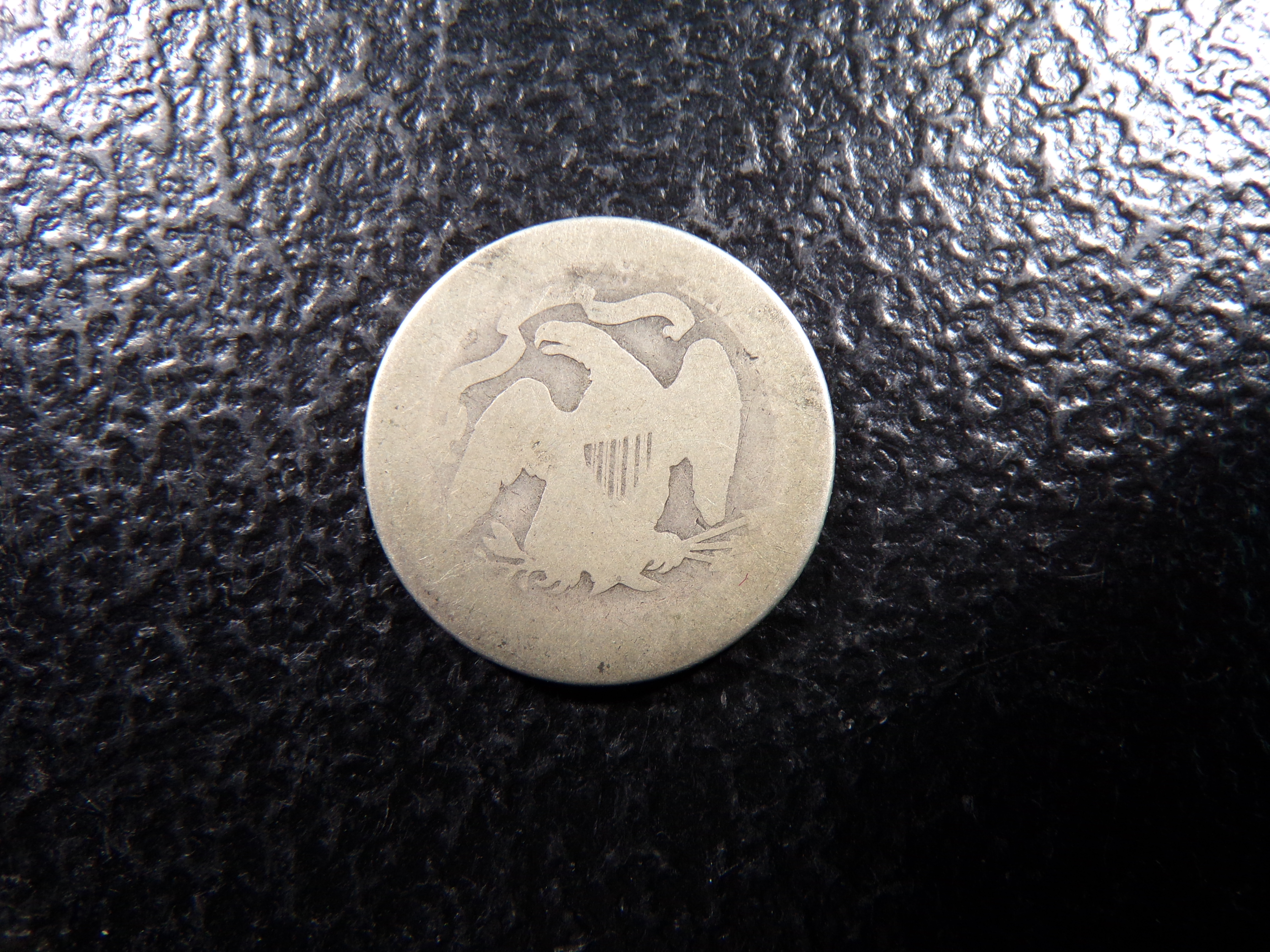 1877 SEATED LIBERTY SILVER QUARTER