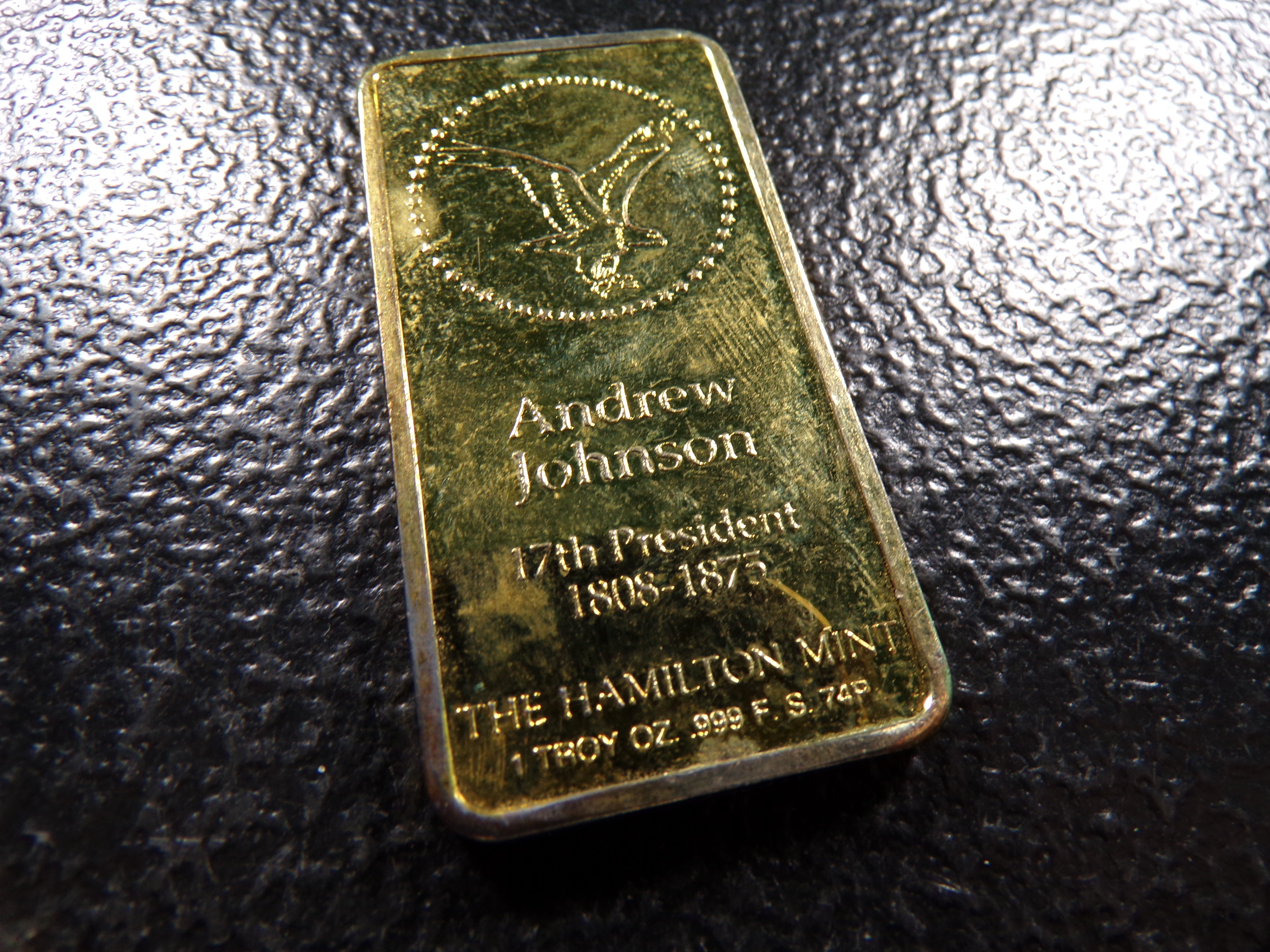 1 OUNCE .999 FINE ANDREW JOHNSON PIERCE SILVER BAR GOLD COLORED