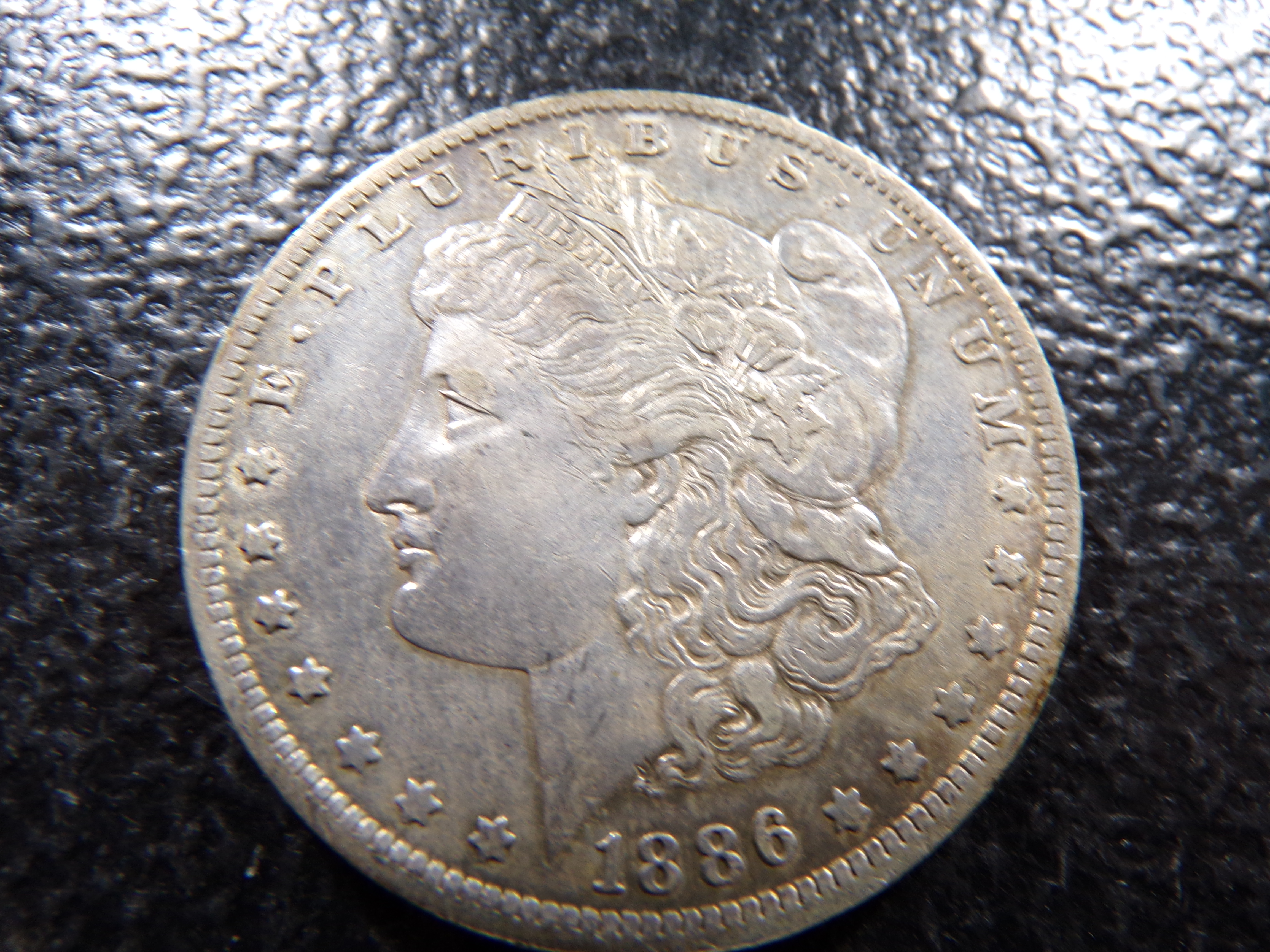 1886-O MORGAN SILVER DOLLAR