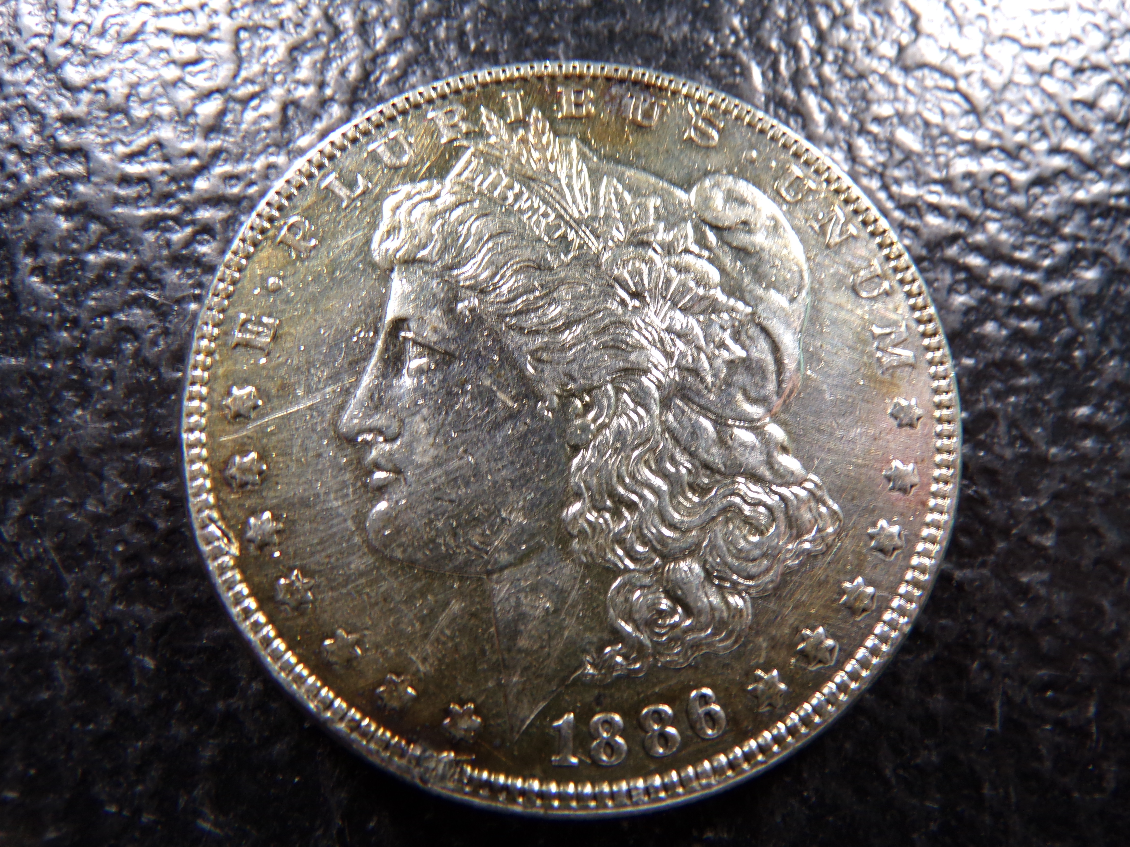 1886 MORGAN SILVER DOLLAR
