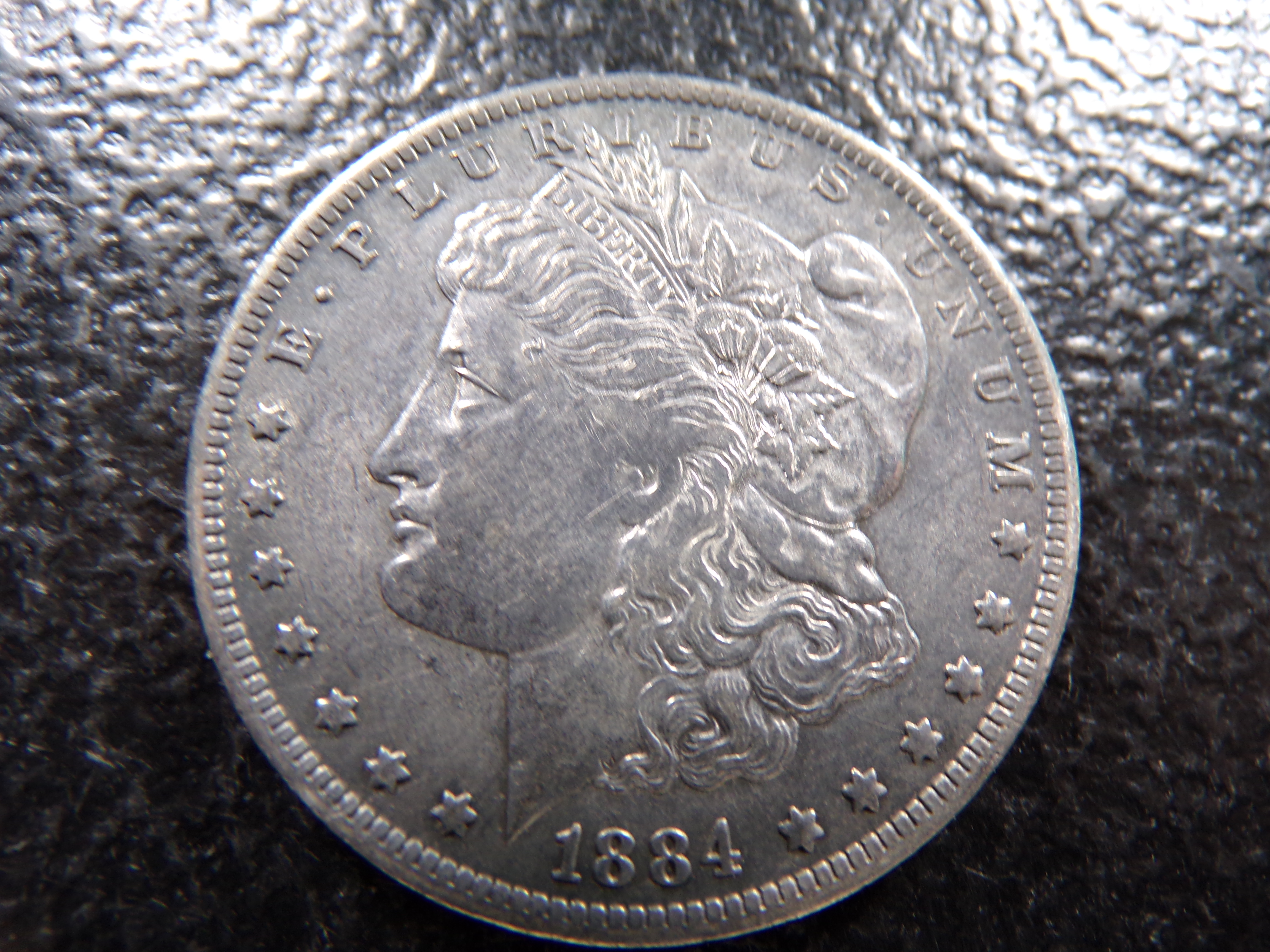 1884-O MORGAN SILVER DOLLAR