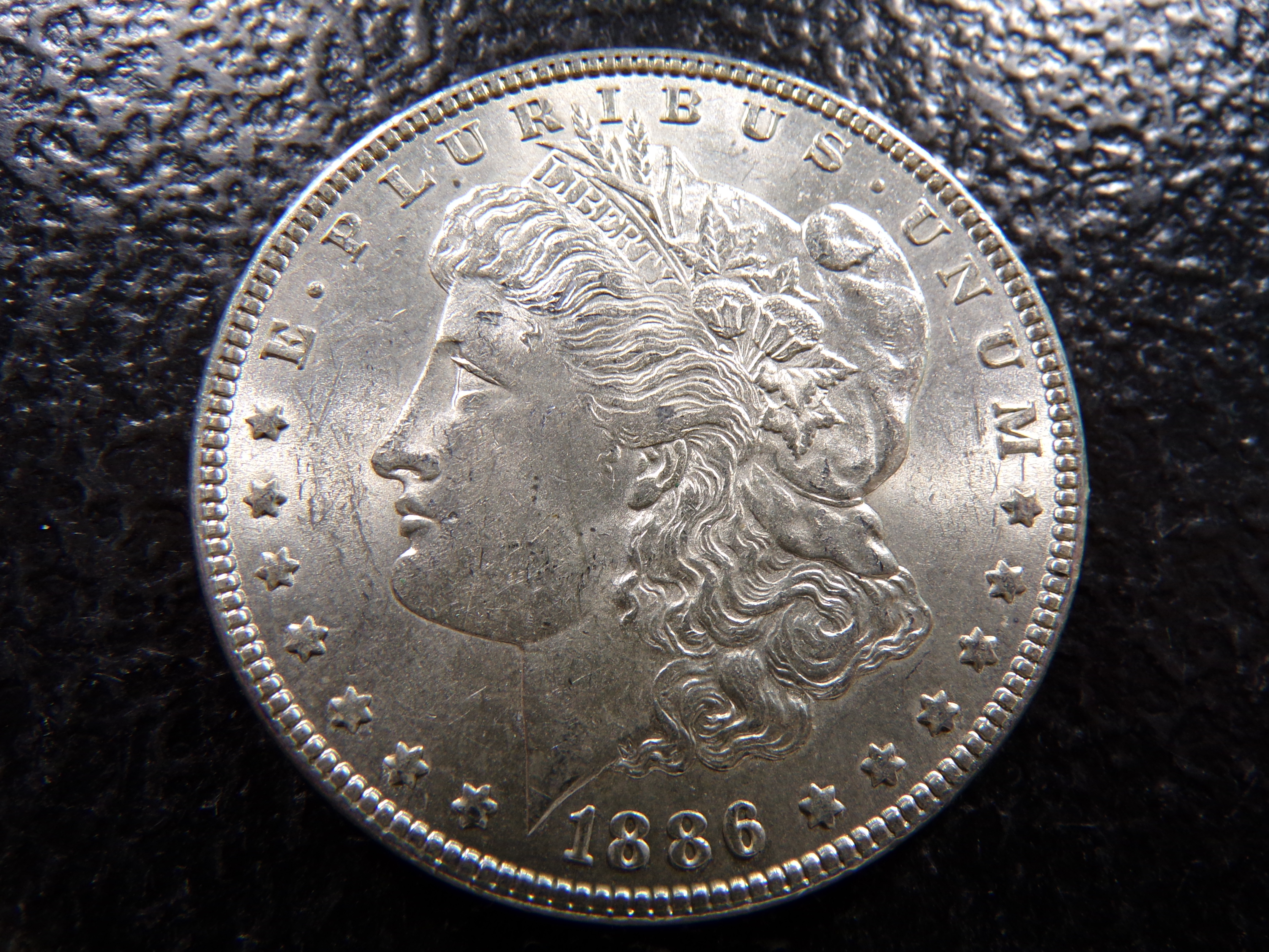 1886 MORGAN SILVER DOLLAR