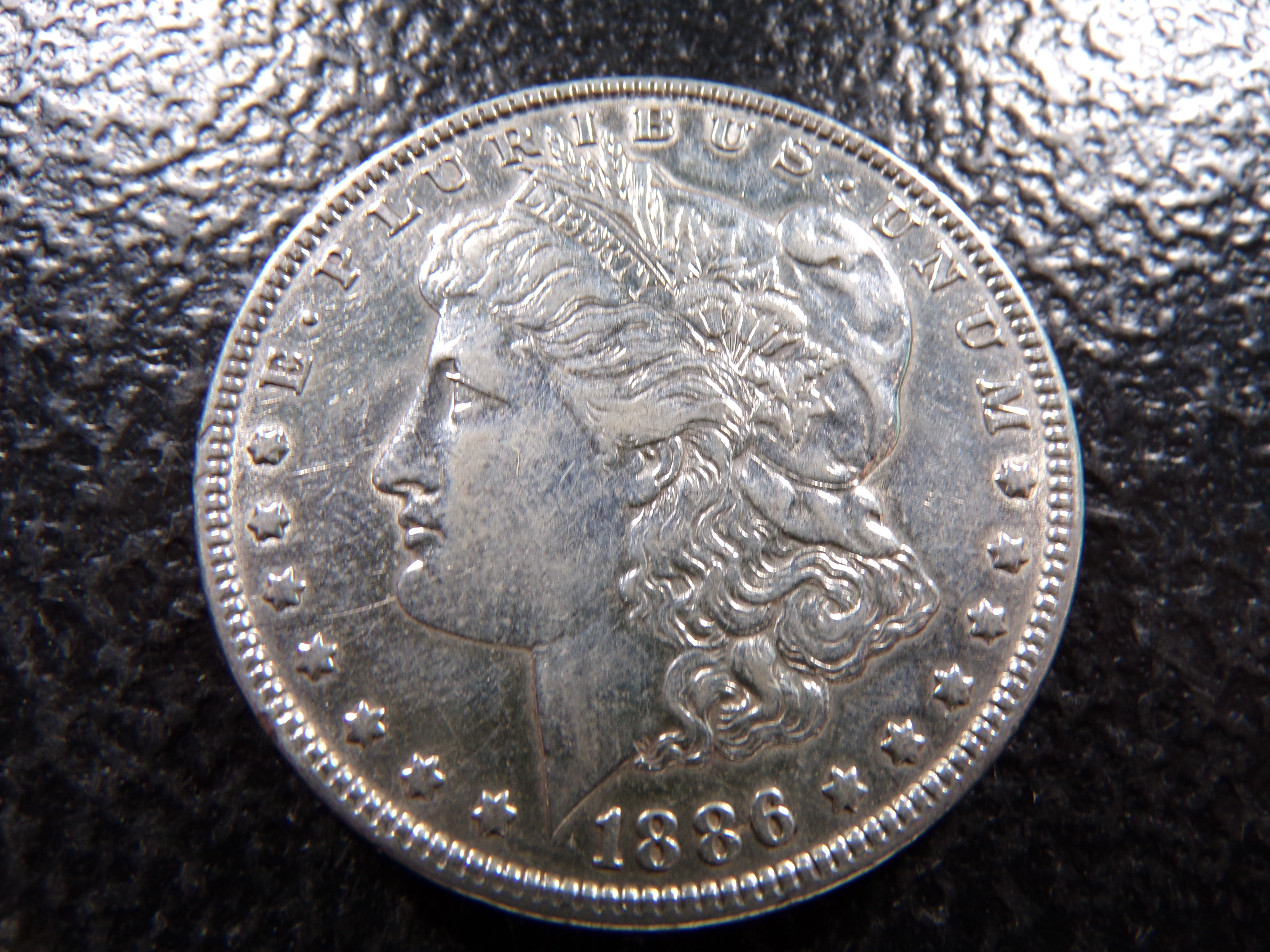 1886 MORGAN SILVER DOLLAR