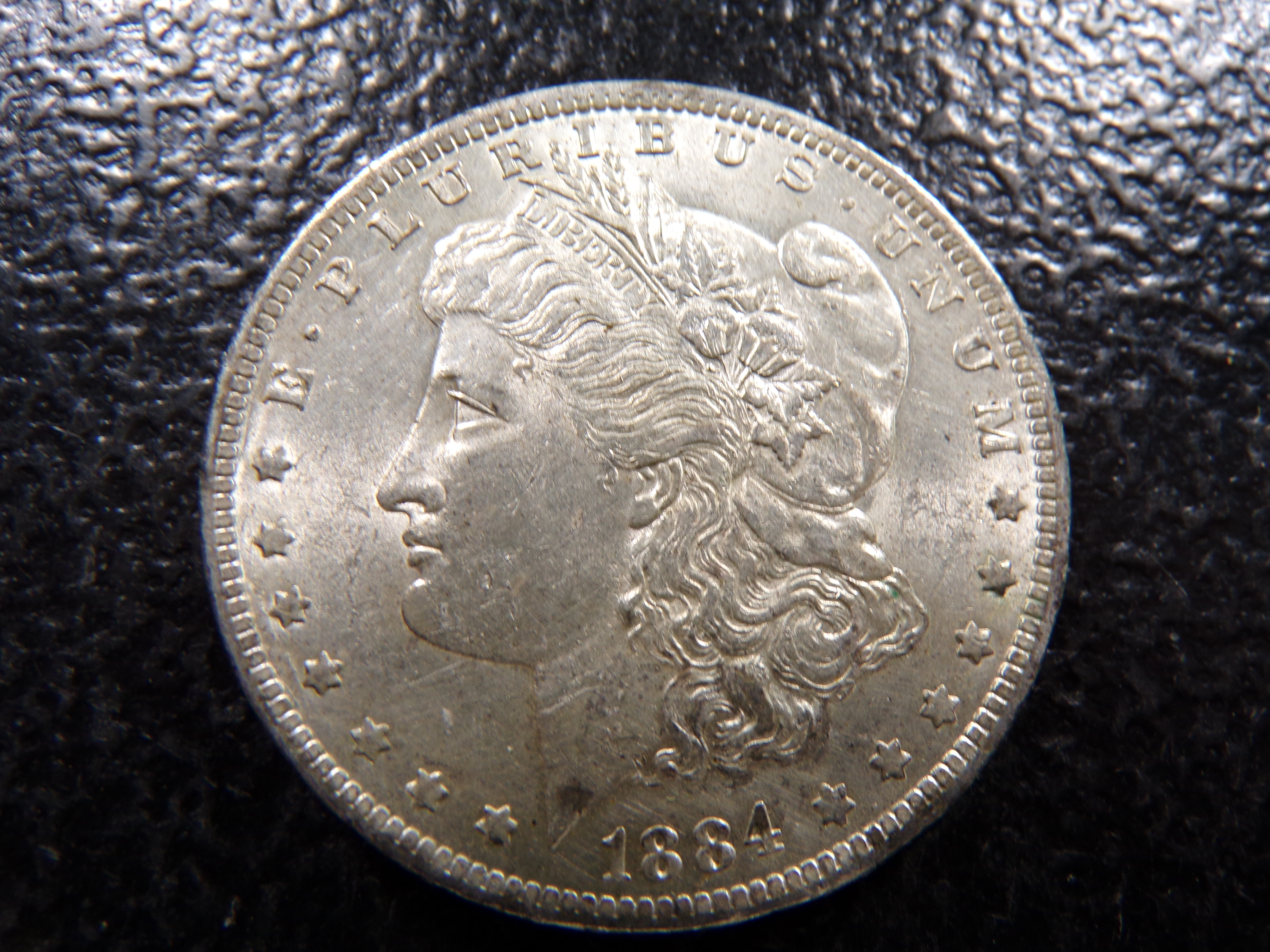 1884 MORGAN SILVER DOLLAR