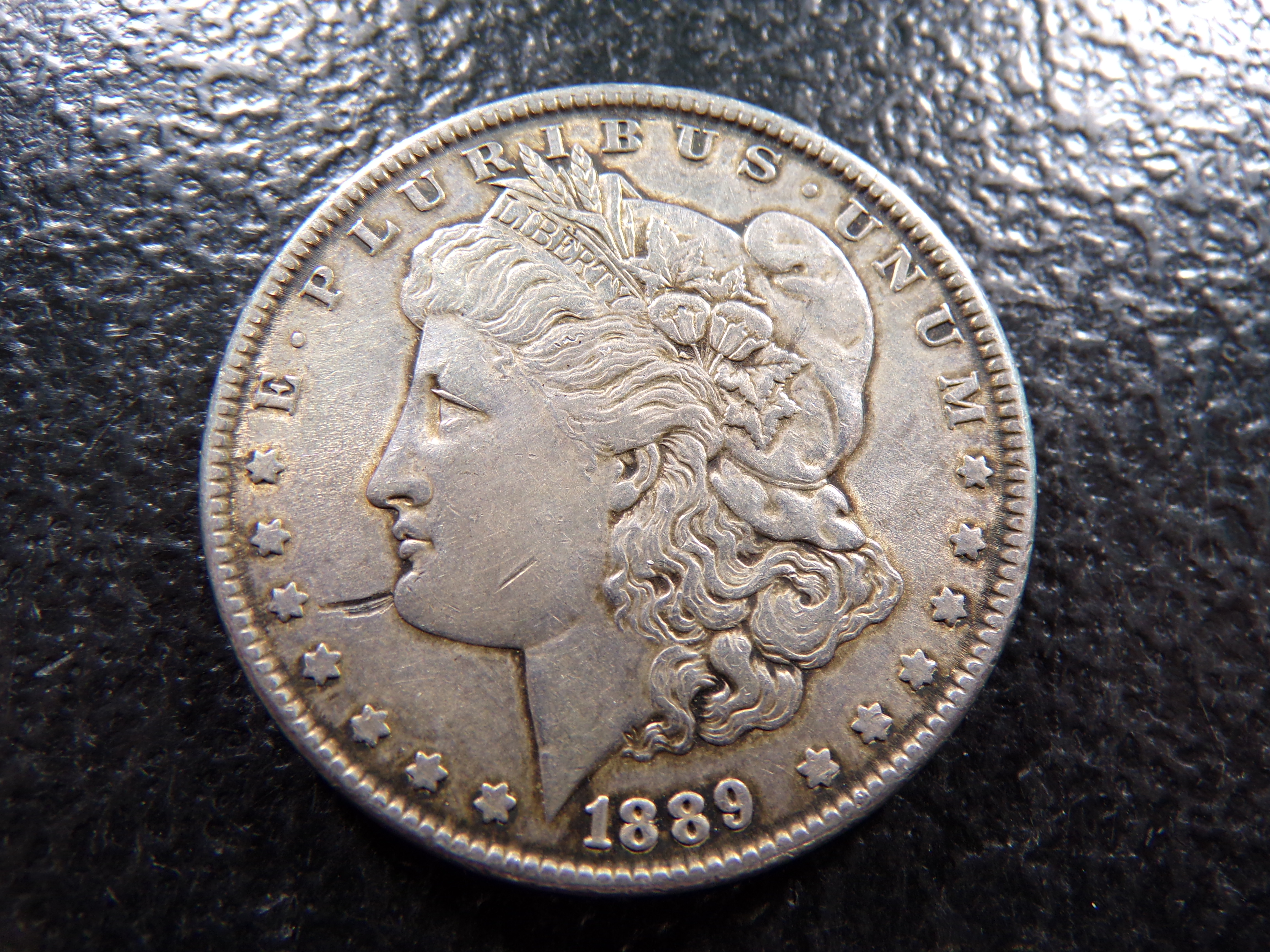 1889 MORGAN SILVER DOLLAR