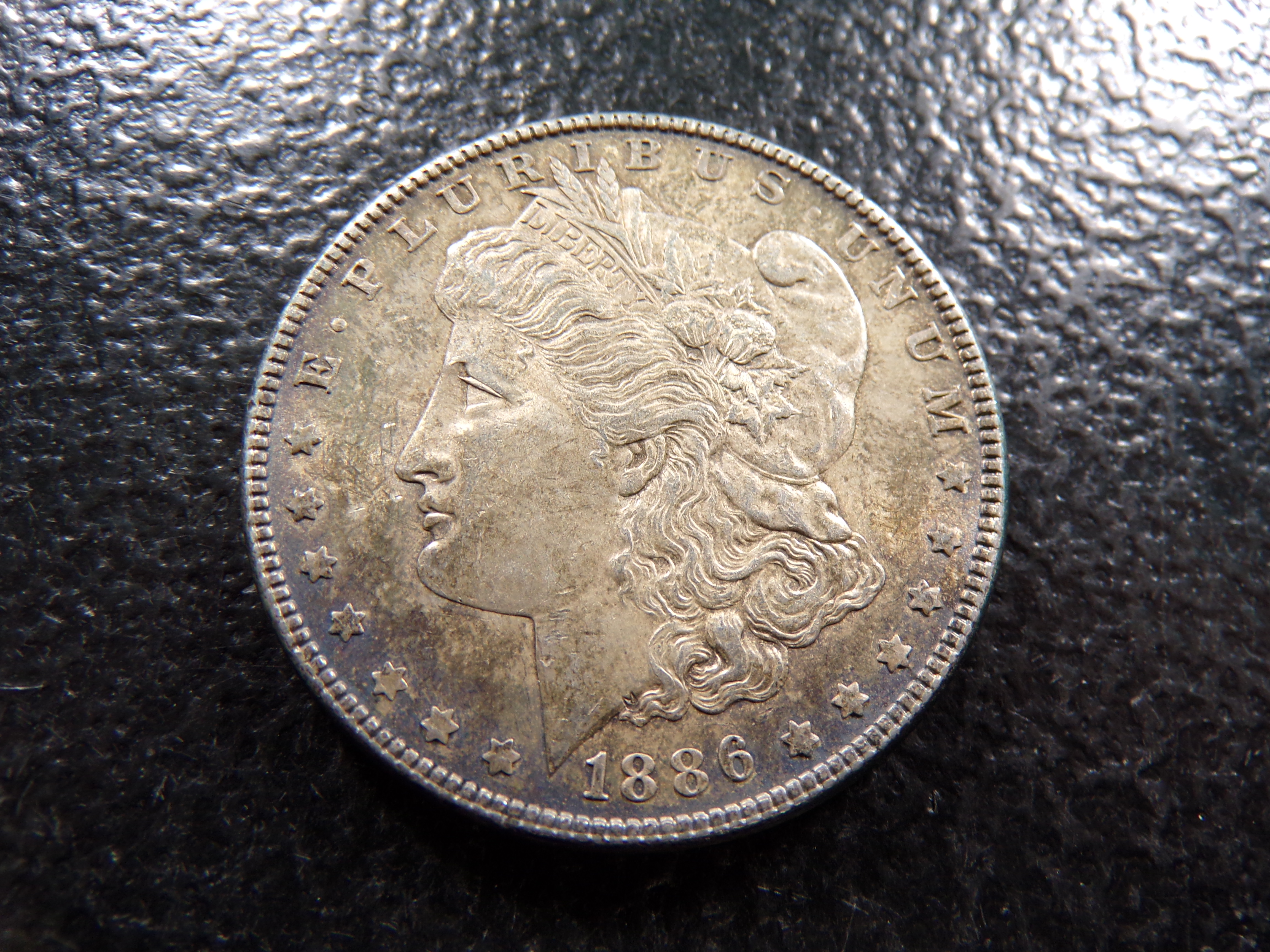 1886 MORGAN SILVER DOLLAR