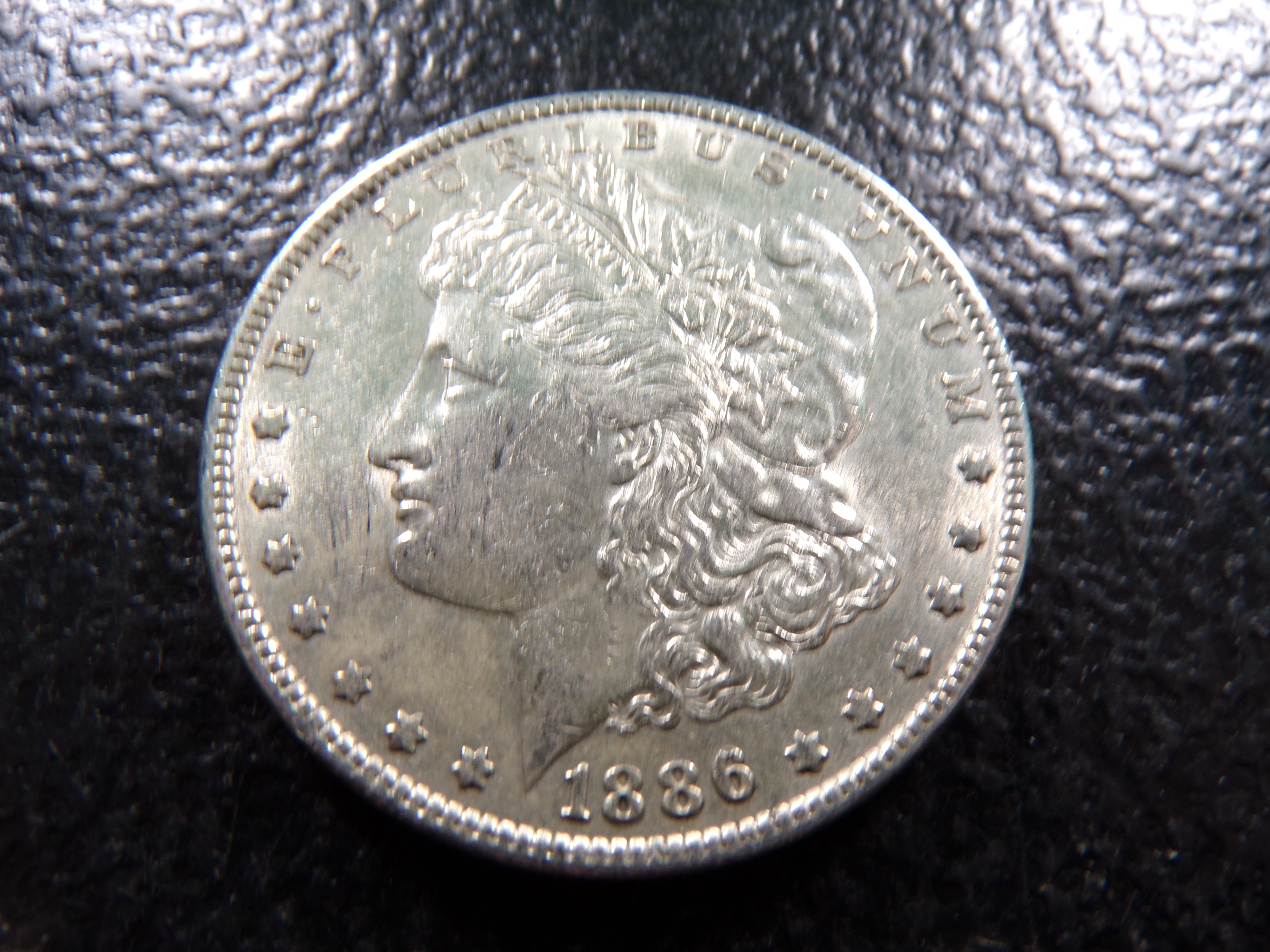 1886 MORGAN SILVER DOLLAR