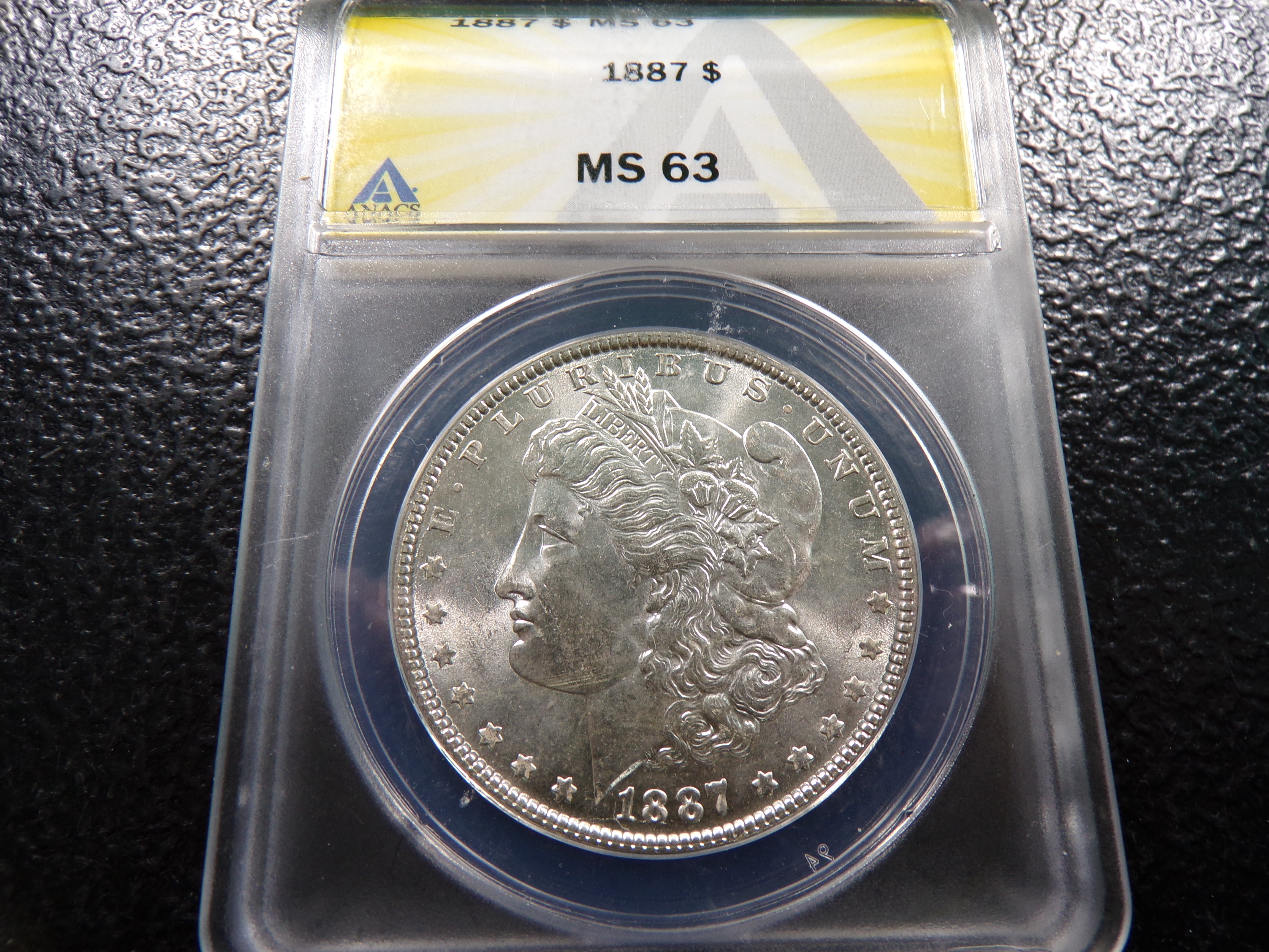 1887 ANACS MS63 MORGAN SILVER DOLLAR
