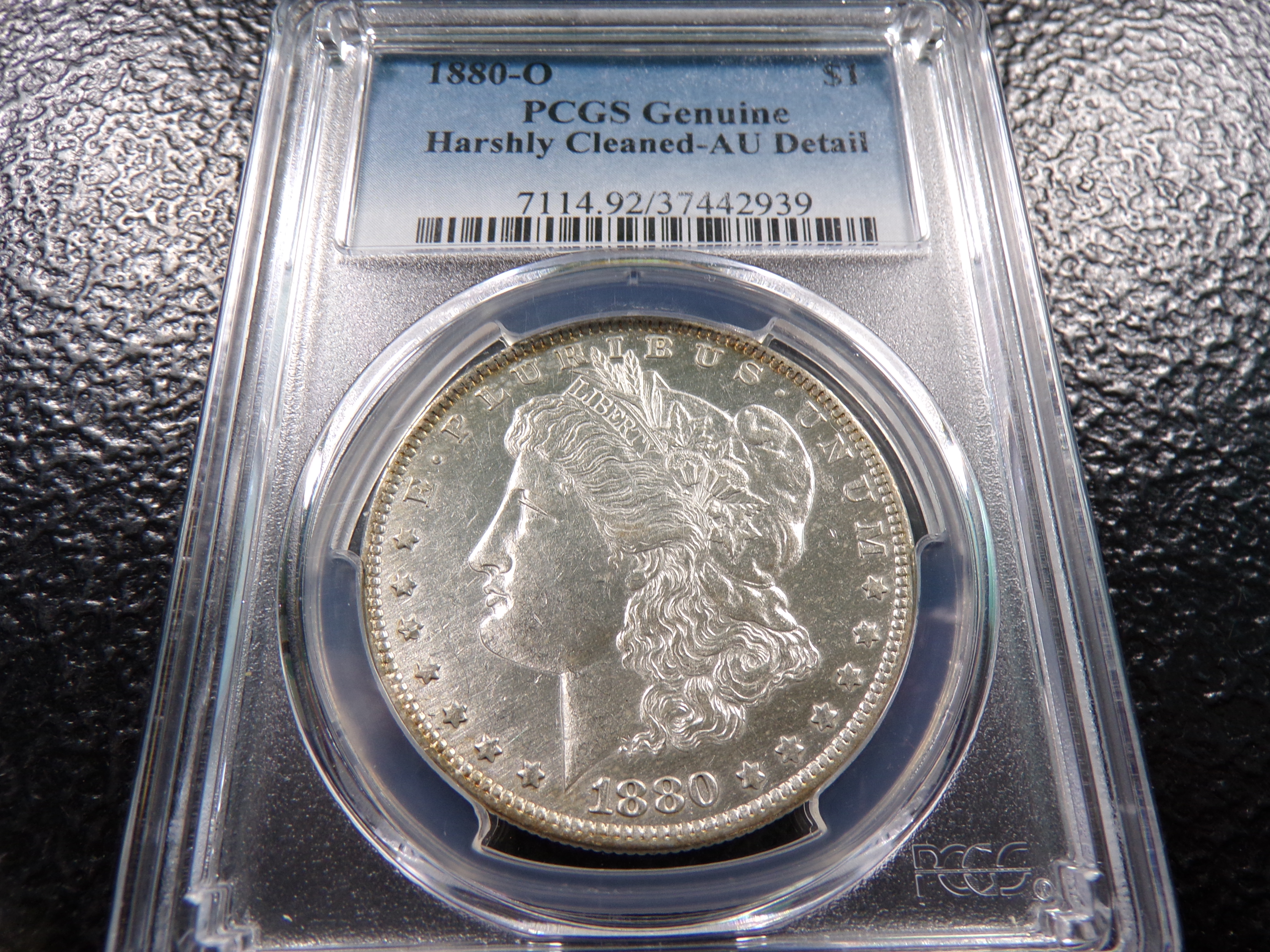 1880-O PCGS AU. DETAIL MORGAN SILVER DOLLAR GENUINE HARSHLY CLEANED