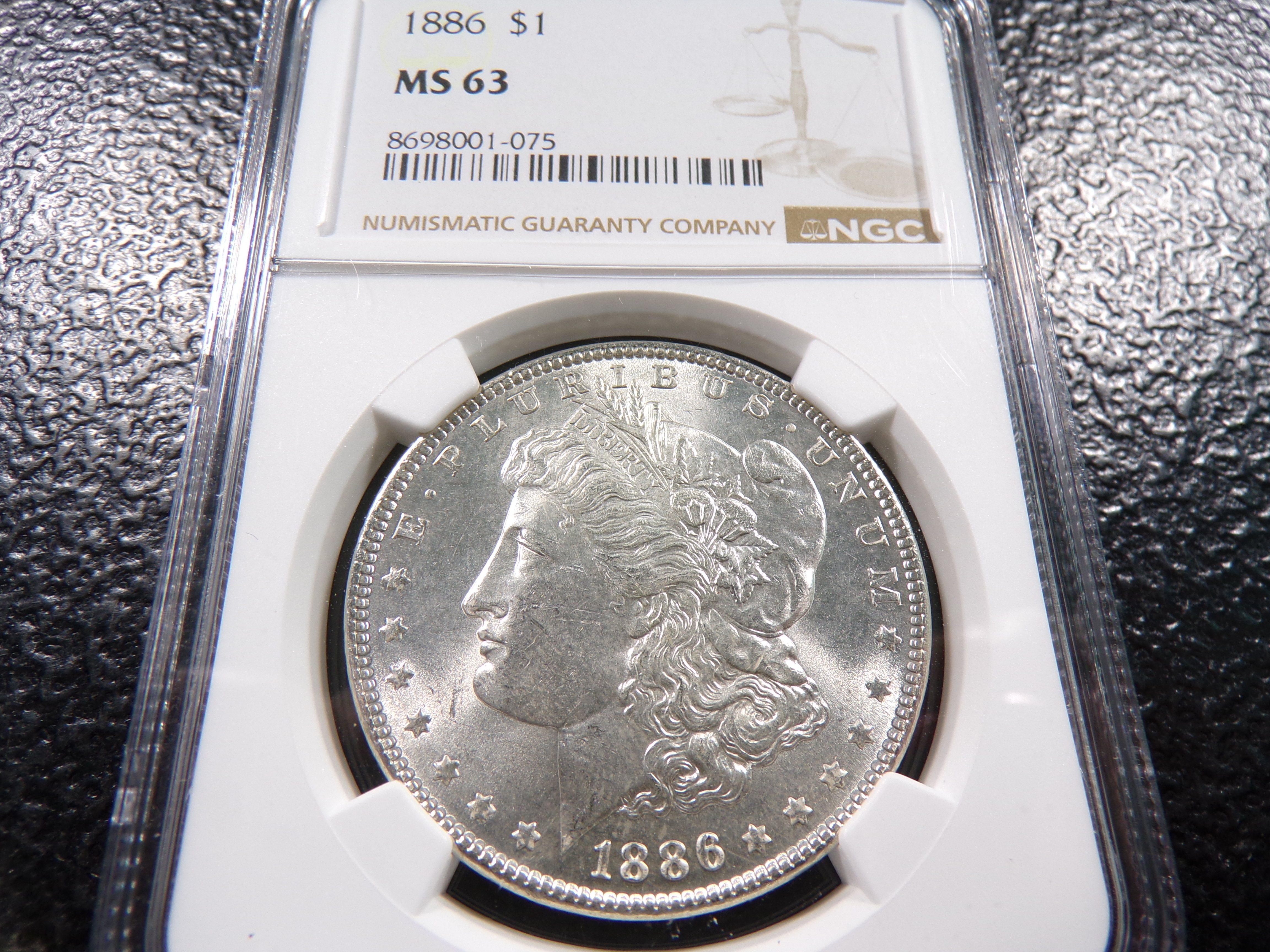 1886 NGC MS63 MORGAN SILVER DOLLAR