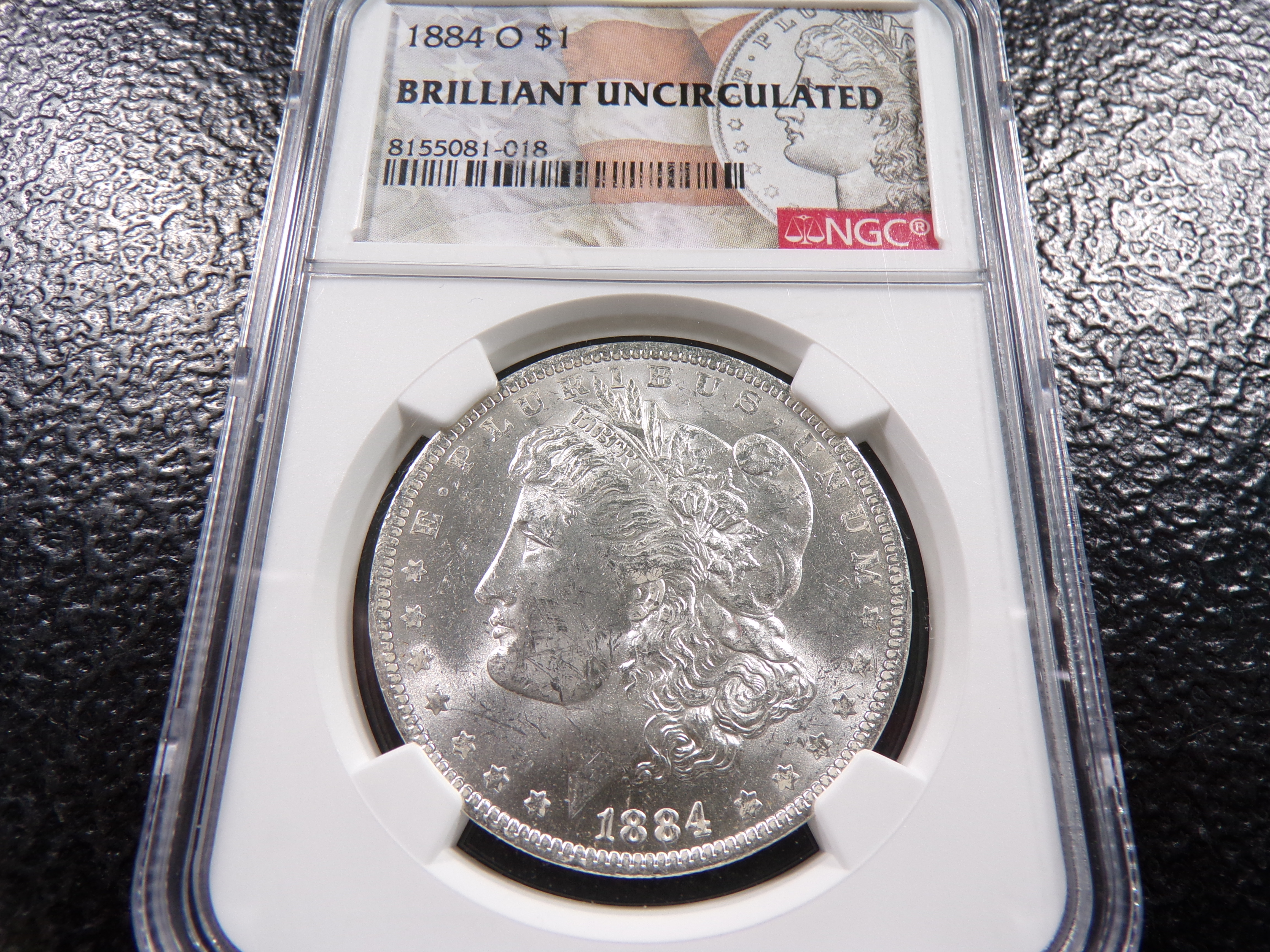1884-O NGC BRILLIANT UNCIRCULATED MORGAN SILVER DOLLAR