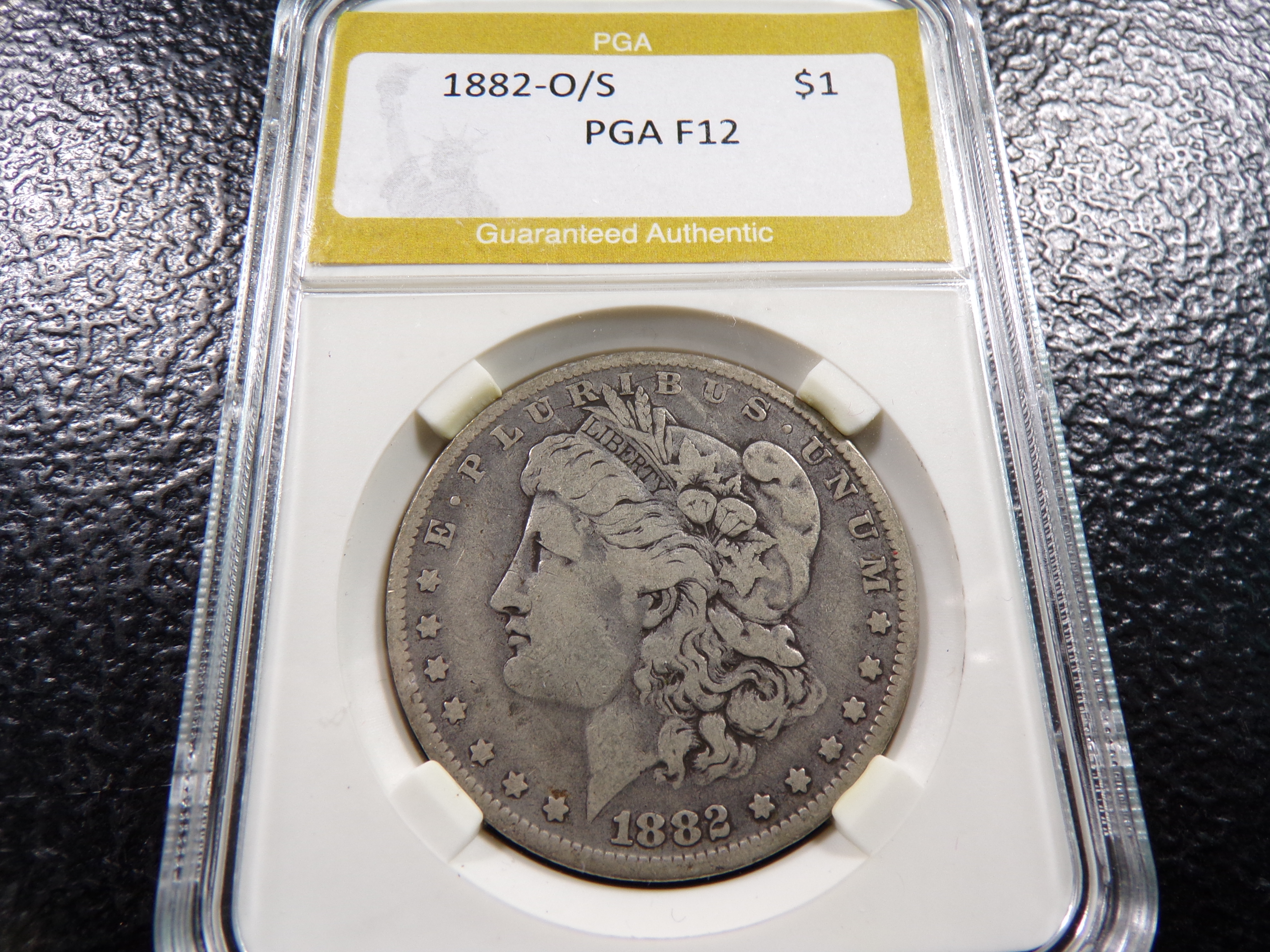 1882-O/S PGA F12 MORGAN SILVER DOLLAR