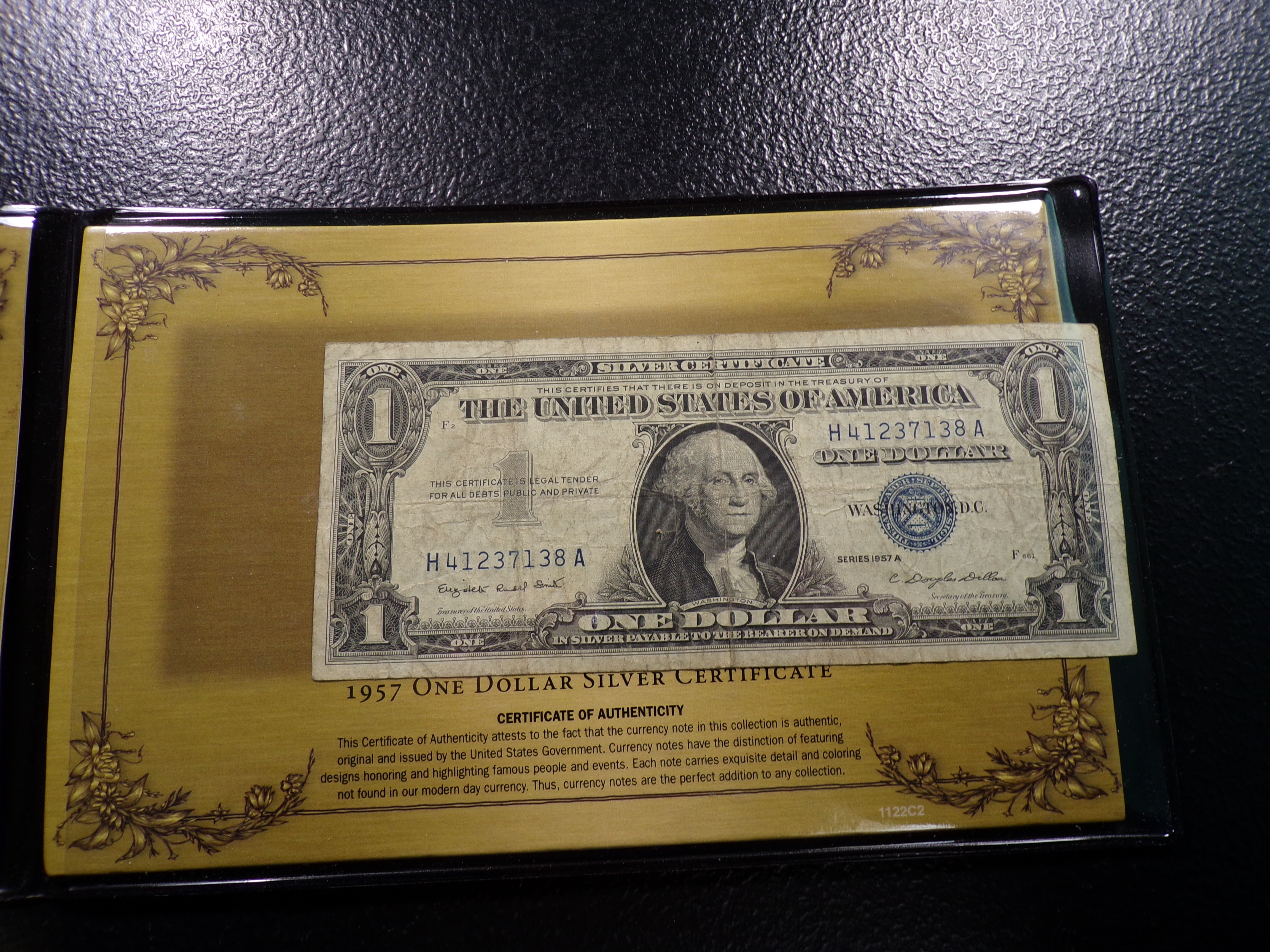 1957-A BLUE SEAL $1 SILVER CERTIFICATE IN DISPLAY HOLDER