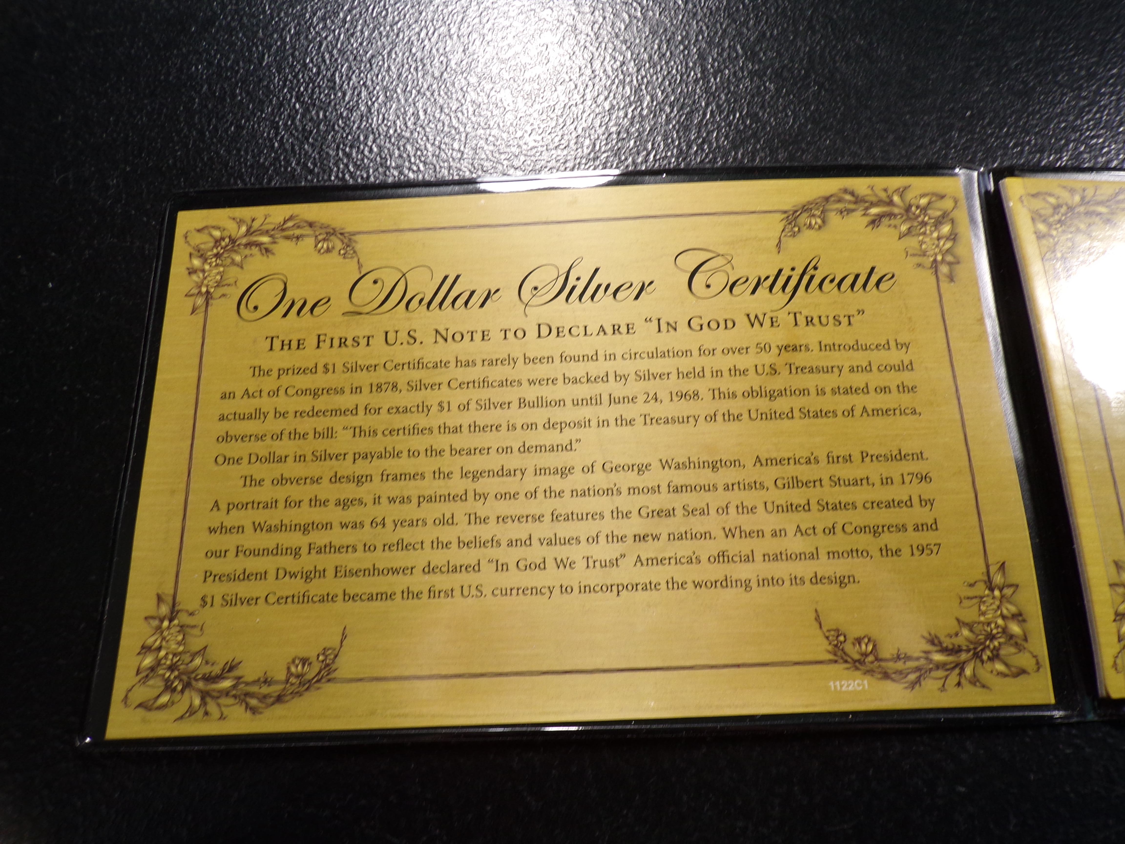 1957-A BLUE SEAL $1 SILVER CERTIFICATE IN DISPLAY HOLDER