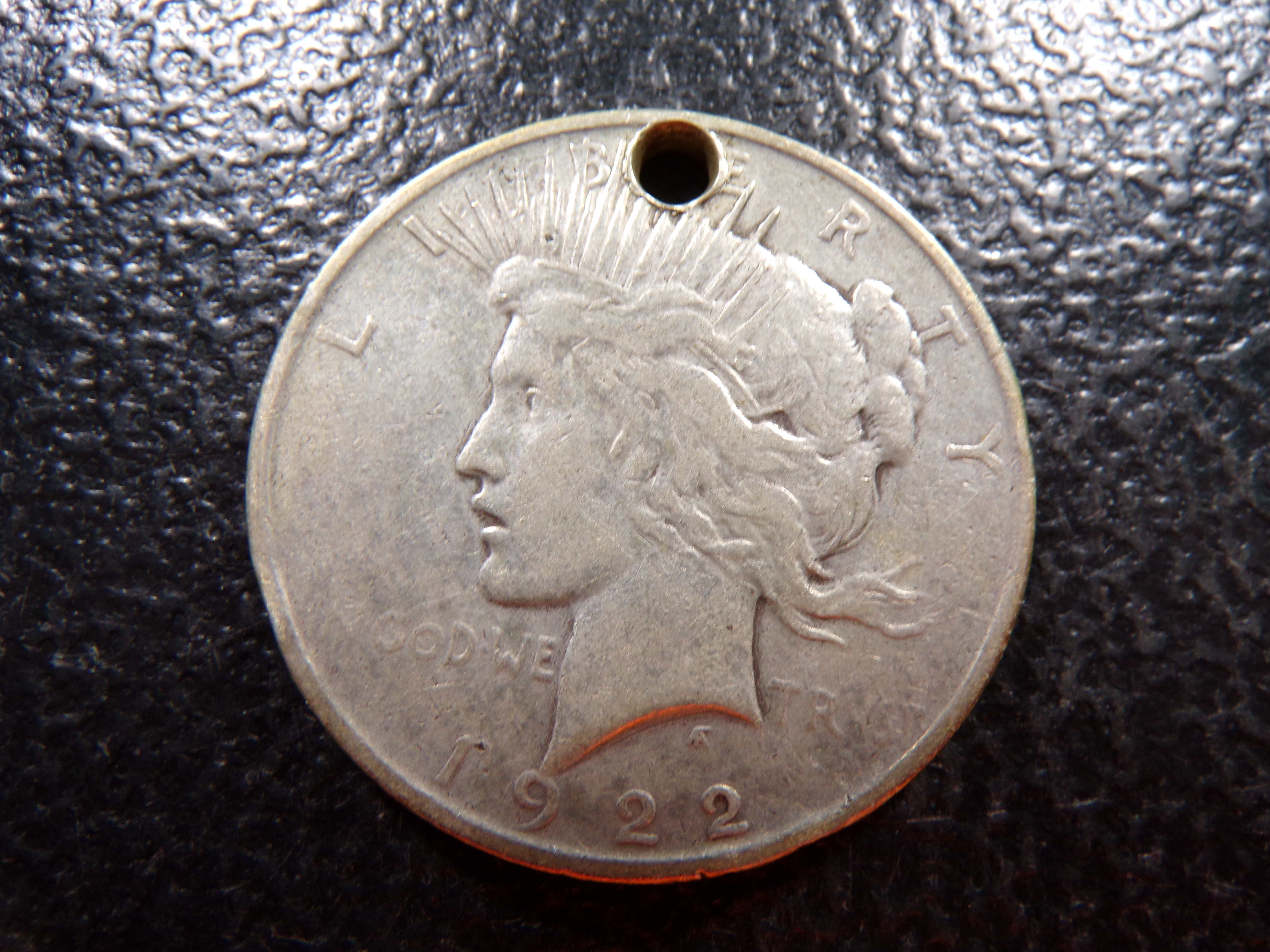 1922 HOLED PEACE SILVER DOLLAR