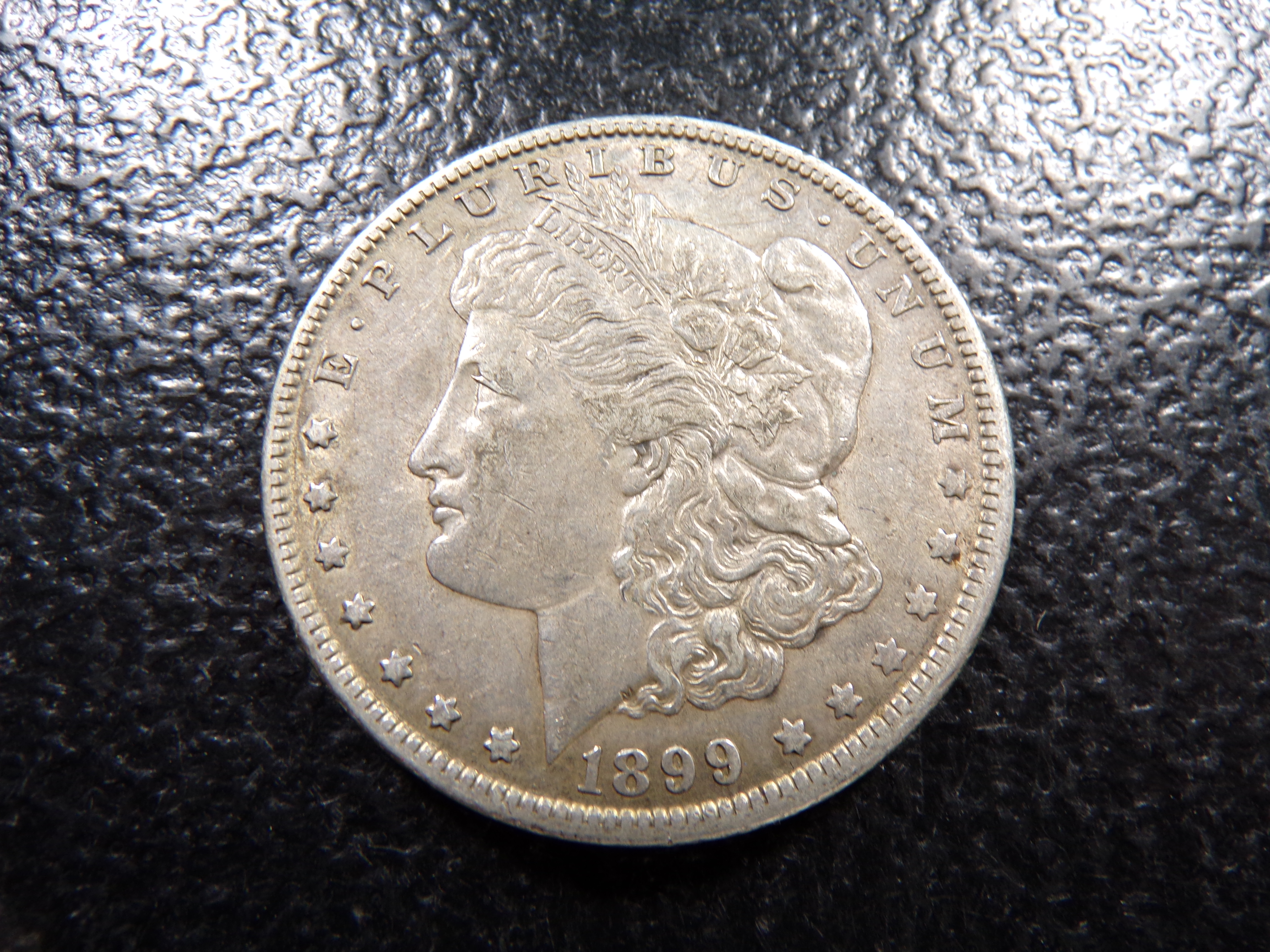 1899-O MORGAN SILVER DOLLAR