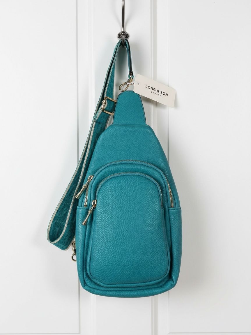 Lot 225: Long & Son Teal Faux Leather Cross Body Bag L10b sku-4742