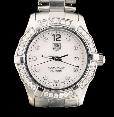 TAG HEUER Diamond Aquaracer Watch. Tag Heuer women's Aquaracer watch. Mother of pearl dial with 