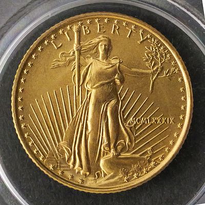 2007 American Gold Eagle $5 Coin. 1/10 oz fine gold, featuring Augustus Saint-Gaudens' Liberty 